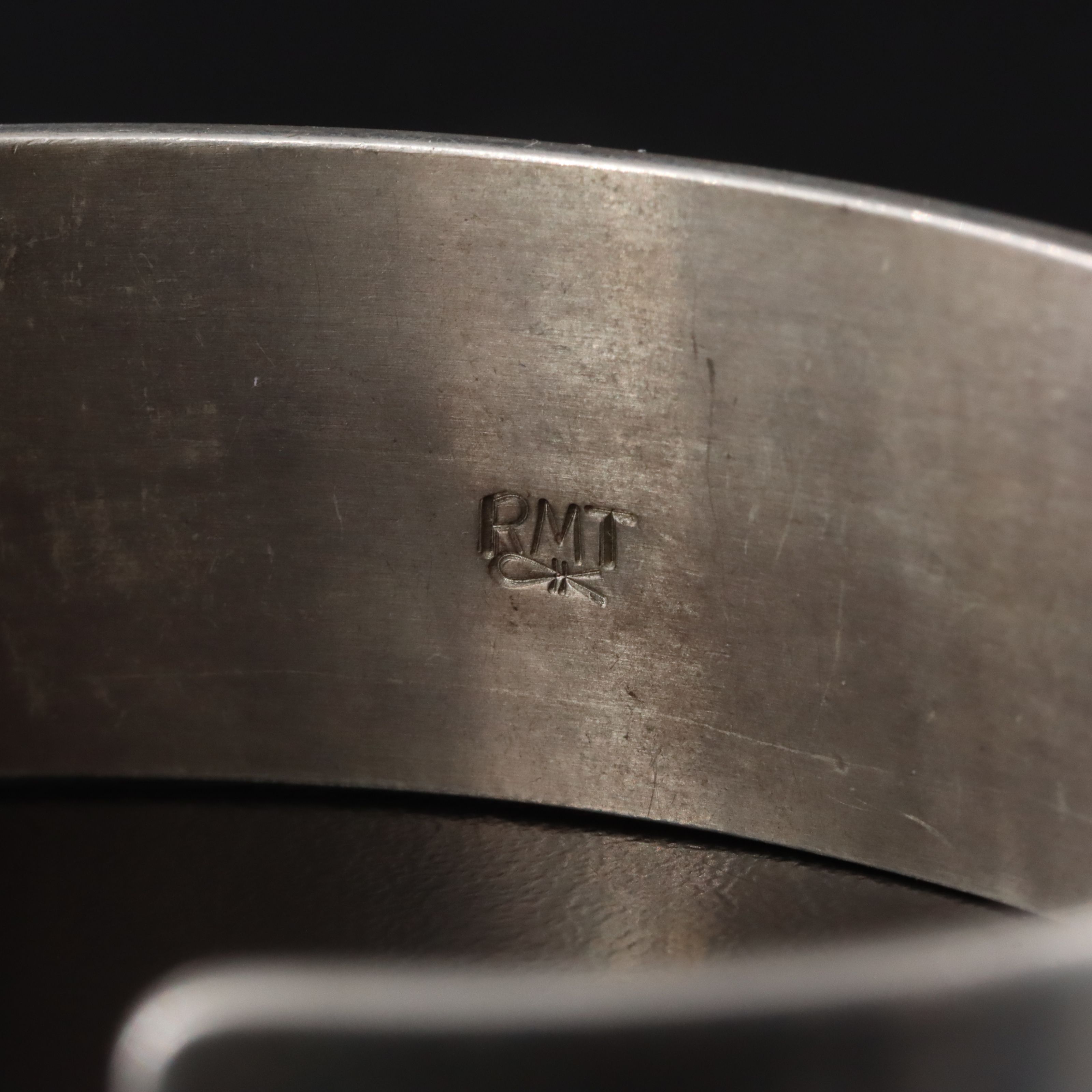 Roderick & Marilyn Tenorio Kewa for Relios Sterling Heartline Bear Cuff