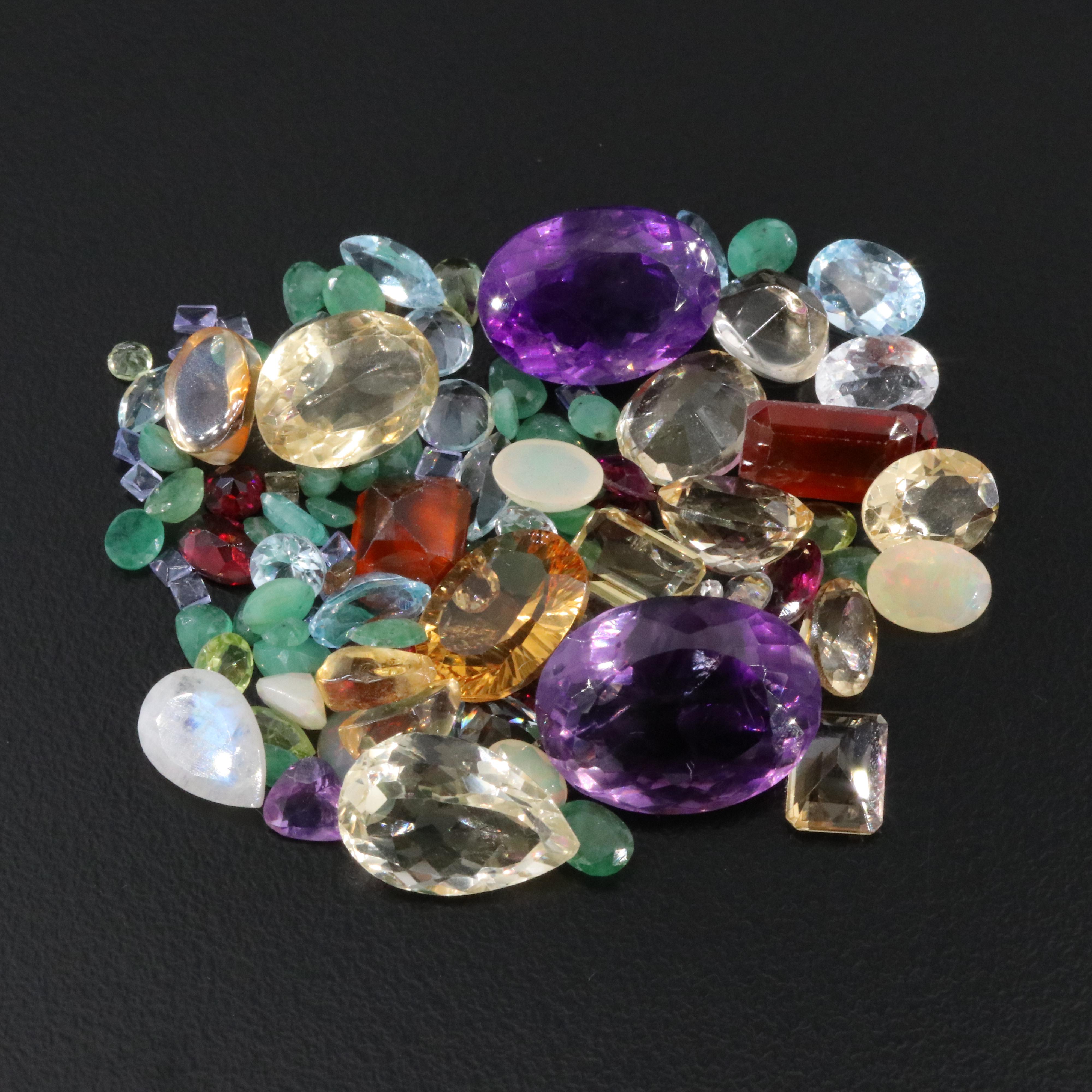 Loose 91.14 CTW Gemstone Lot Including Rainbow Moonstone, Emerald and Amethyst
