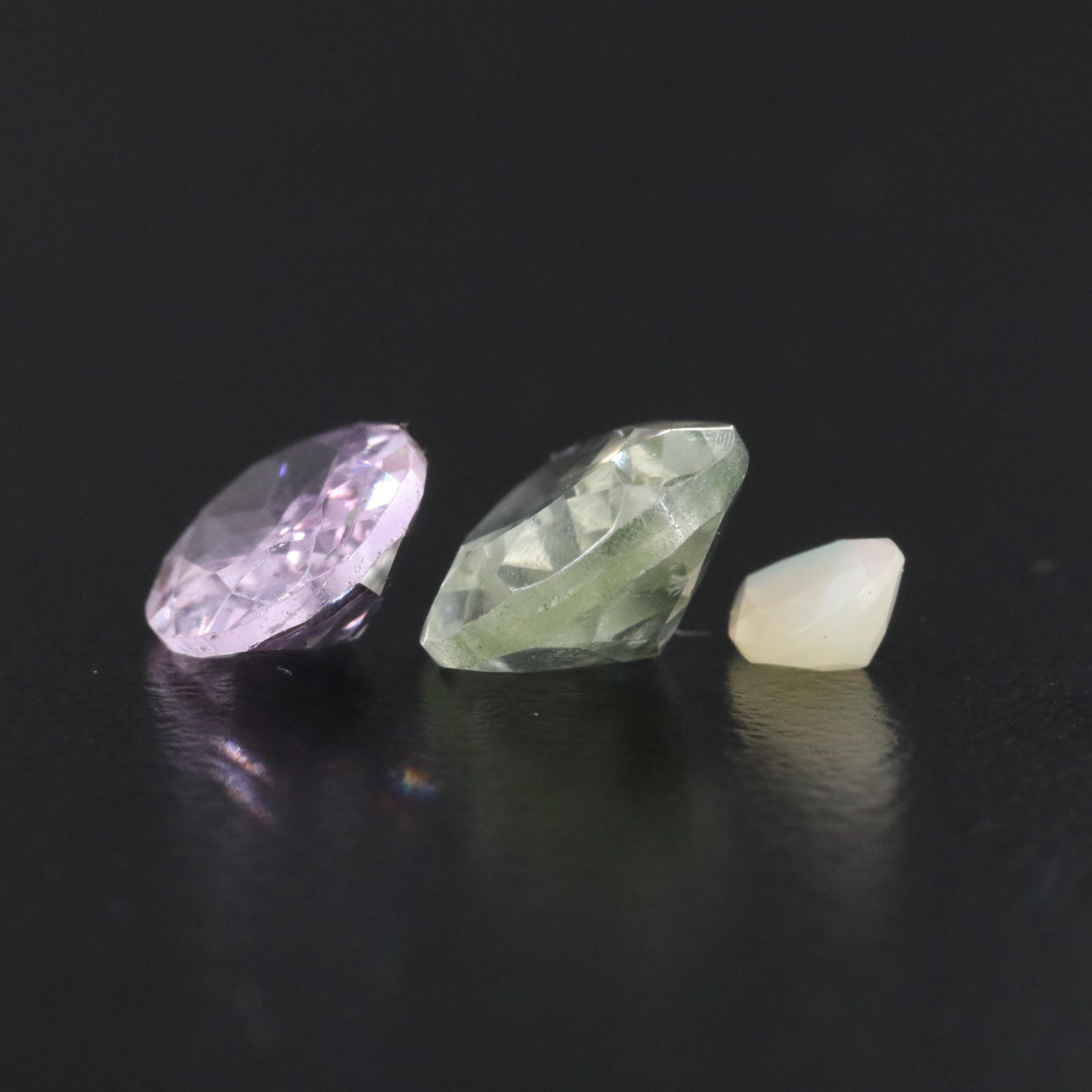 Loose 52.92 Gemstones Featuring Amethyst, Emerald and Citrine
