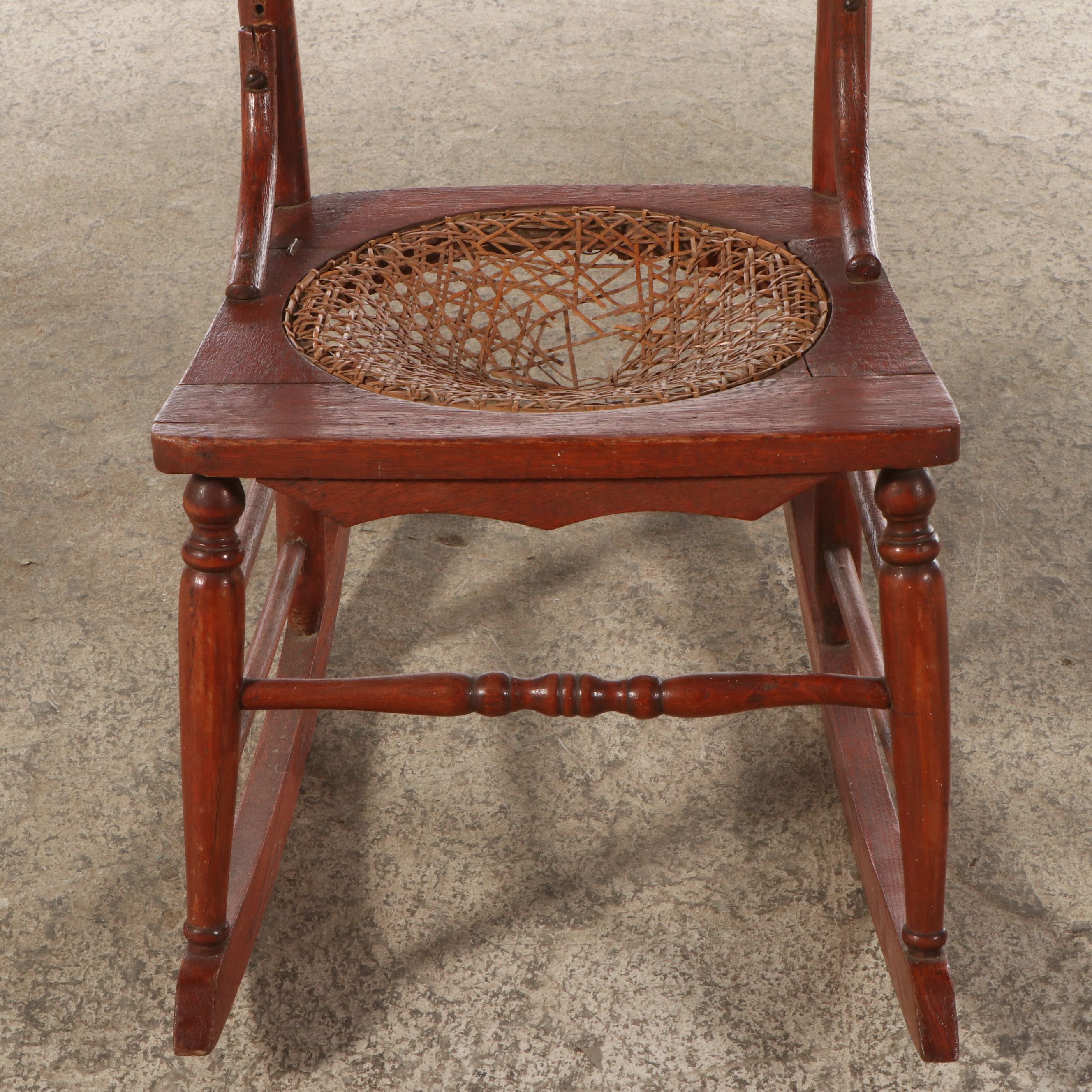 Late Victorian Carved Oak Rocking Chair with Cane Bottom Seat