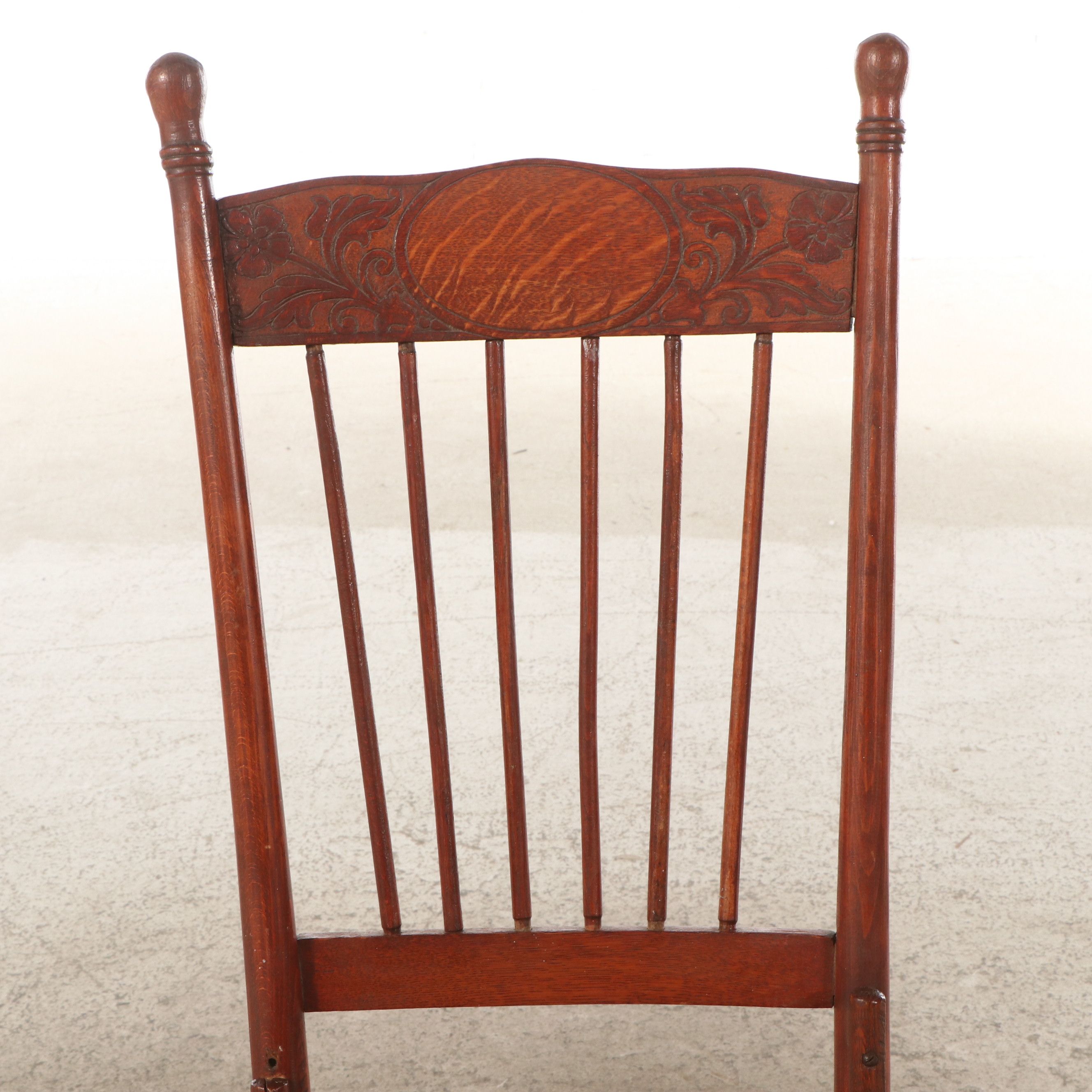 Late Victorian Carved Oak Rocking Chair with Cane Bottom Seat