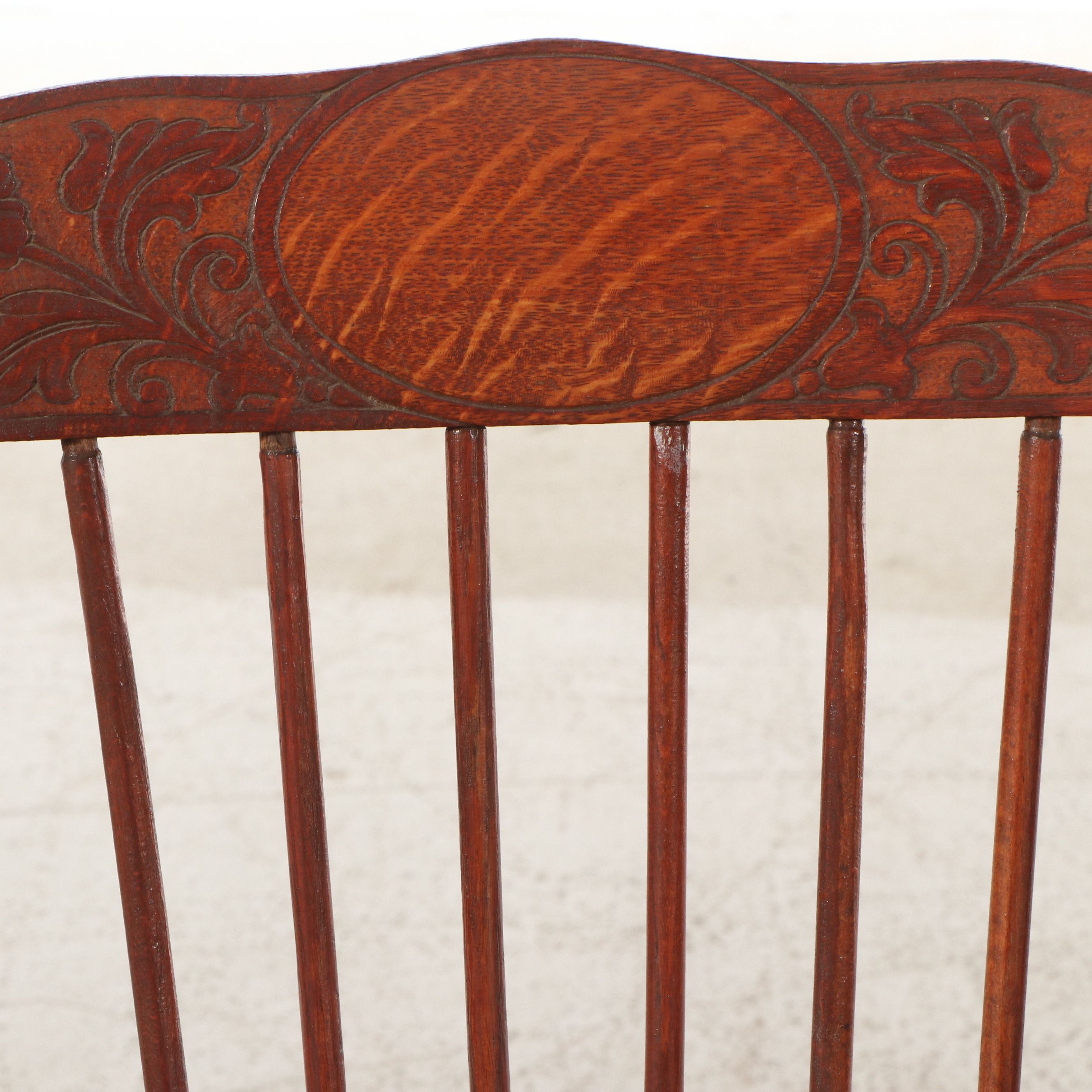 Late Victorian Carved Oak Rocking Chair with Cane Bottom Seat