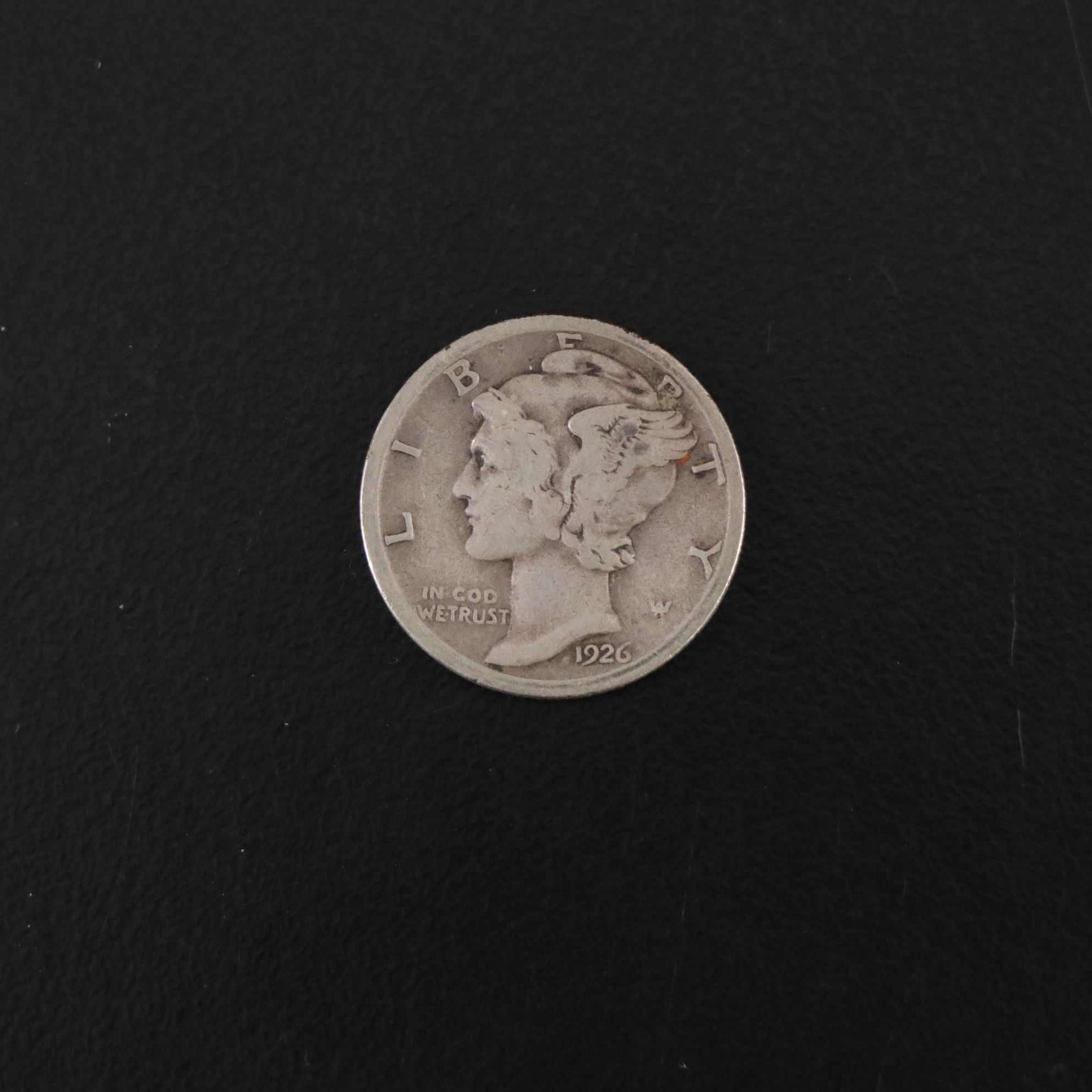 Walking Liberty Half Dollar, Standing Liberty Quarter, and Mercury Dime