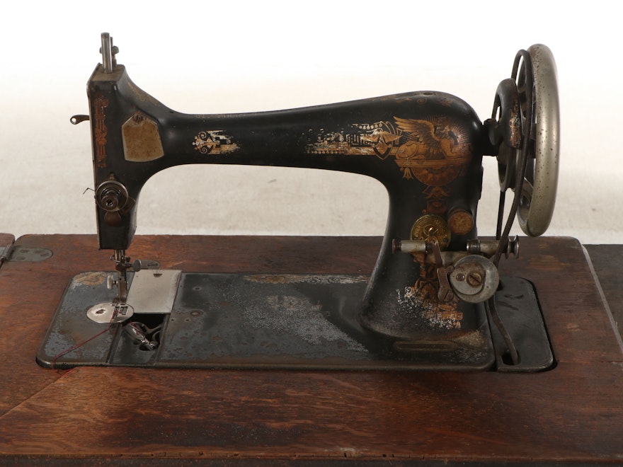 Singer Model 27 Sewing Machine with Oak Five-Drawer Treadle Table, c ...