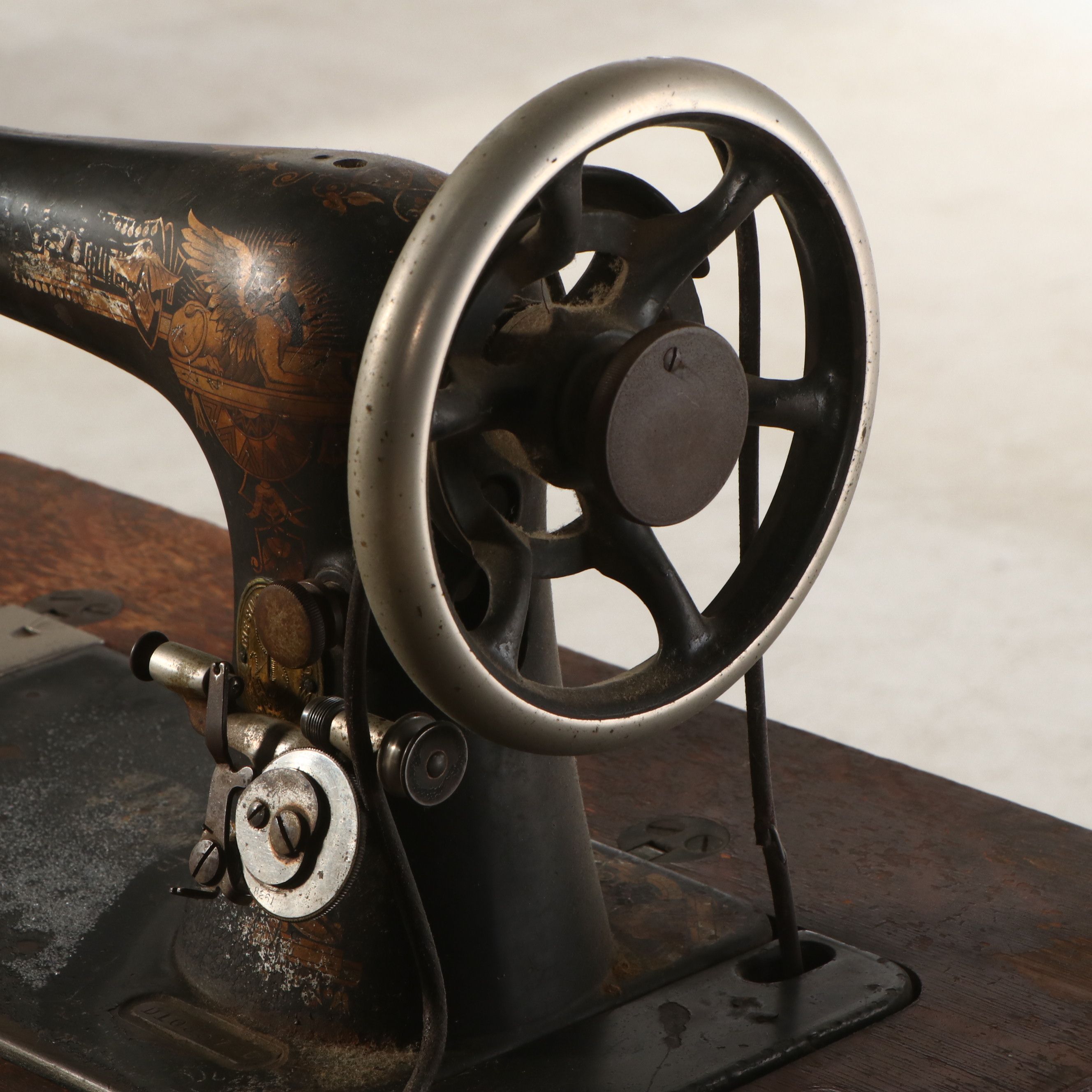 Singer Model 27 Sewing Machine with Oak Five-Drawer Treadle Table, c. 1909