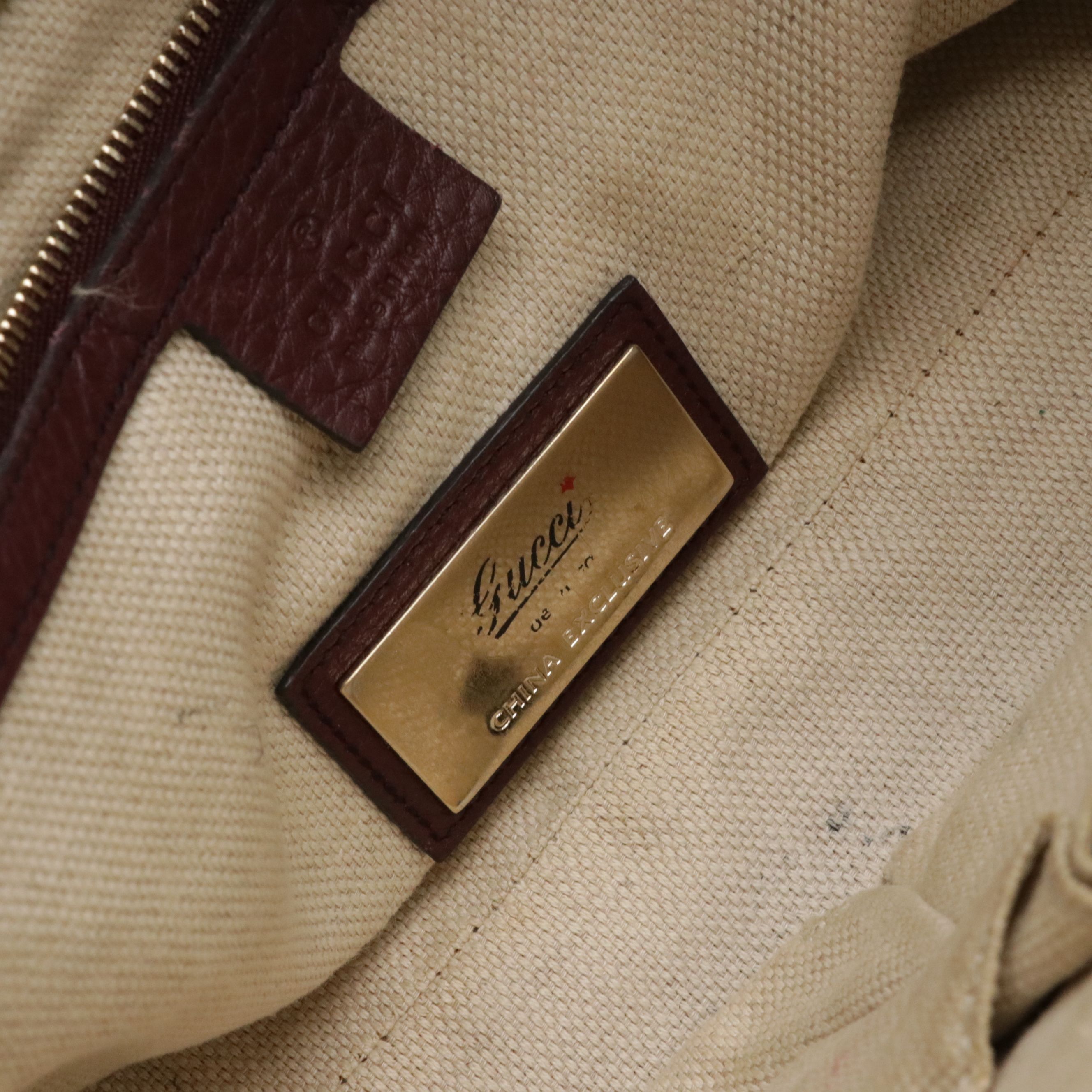 Gucci Interlocking GG Soho Tassel Two-Way Bag in Pebbled Leather