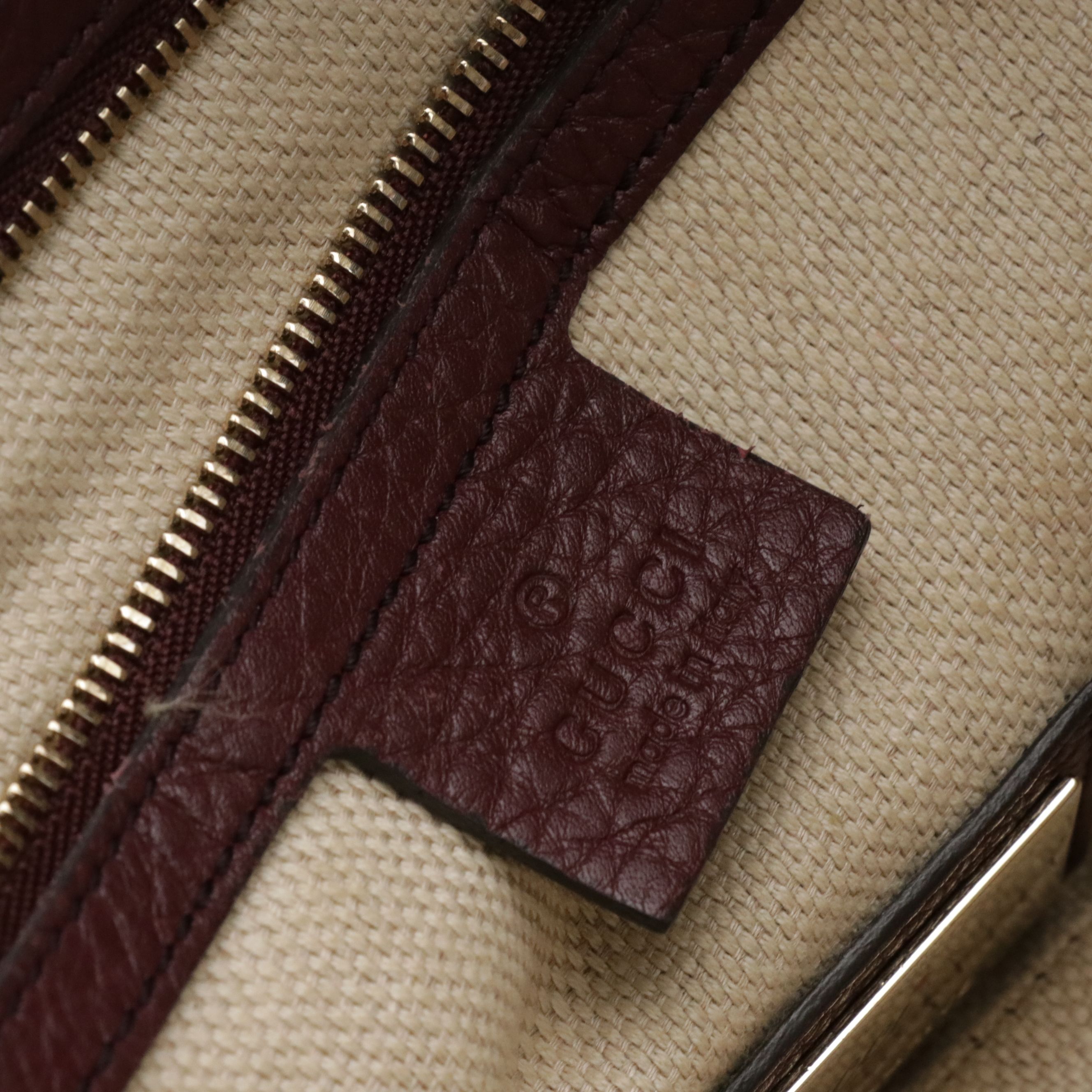 Gucci Interlocking GG Soho Tassel Two-Way Bag in Pebbled Leather