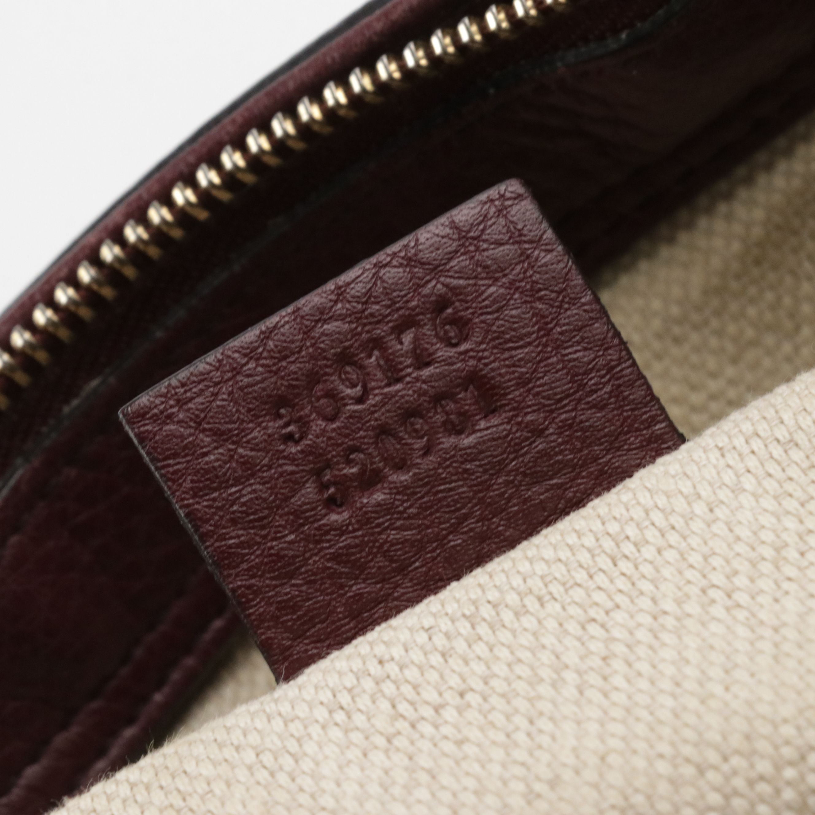 Gucci Interlocking GG Soho Tassel Two-Way Bag in Pebbled Leather