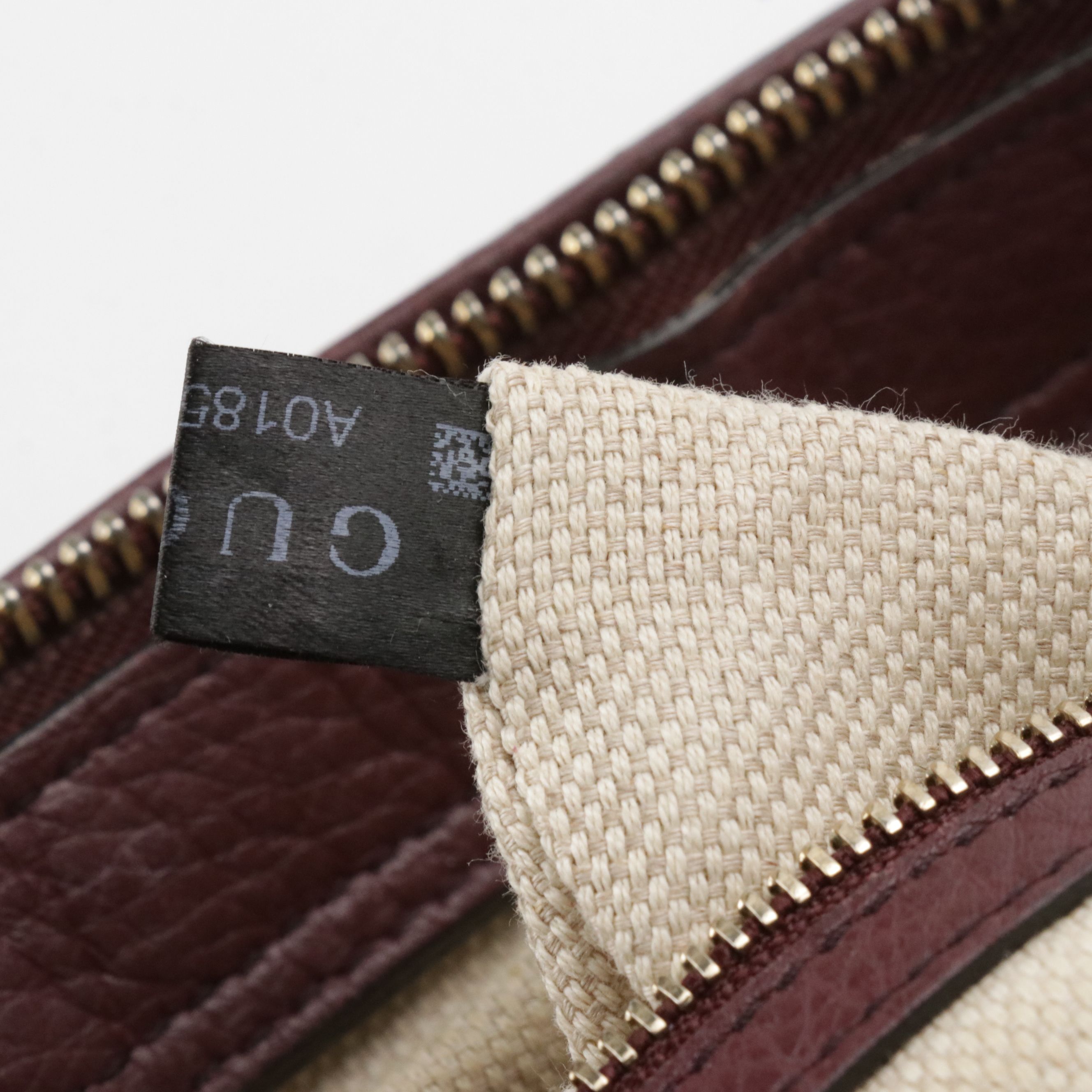 Gucci Interlocking GG Soho Tassel Two-Way Bag in Pebbled Leather