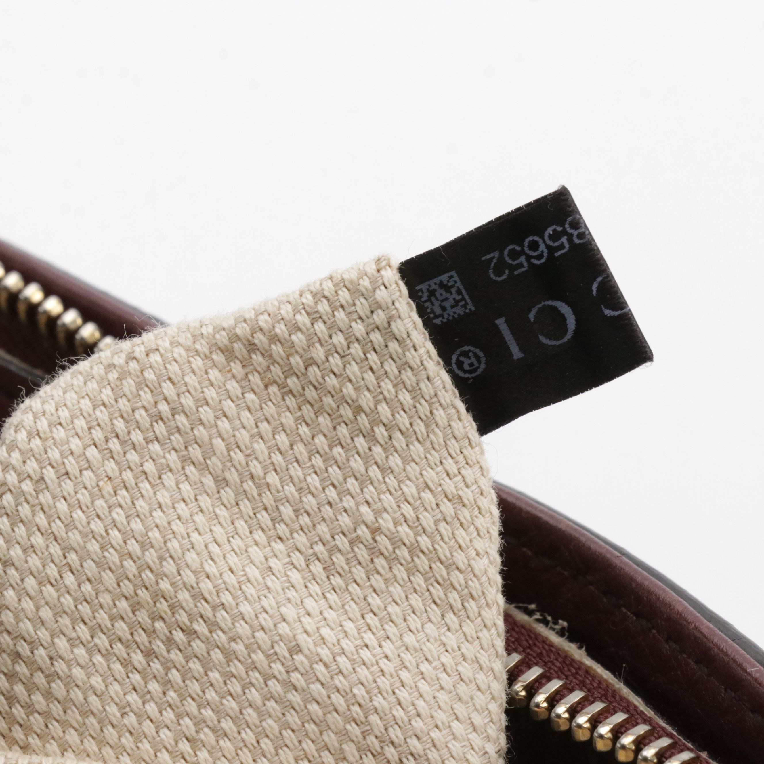 Gucci Interlocking GG Soho Tassel Two-Way Bag in Pebbled Leather