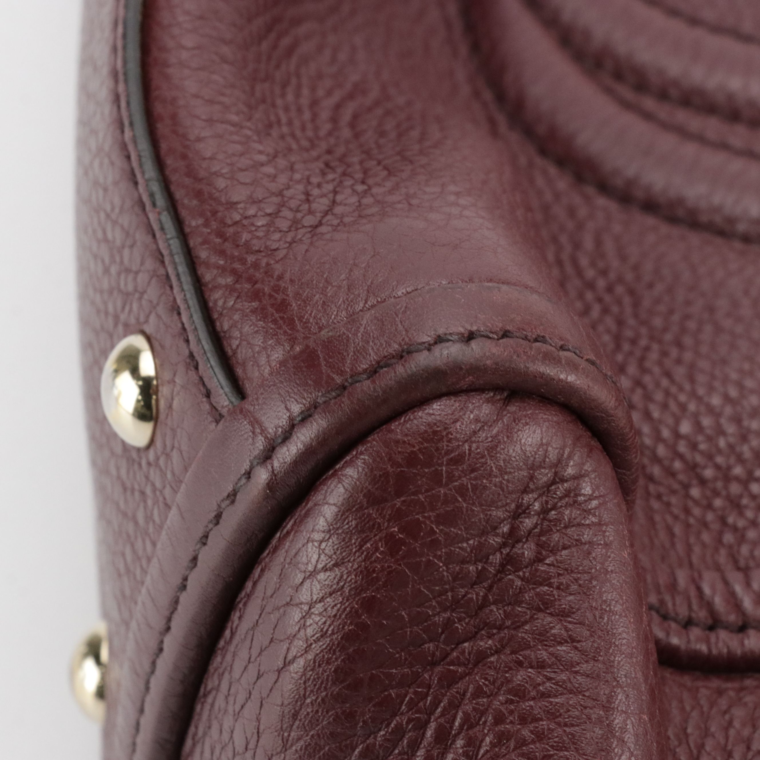 Gucci Interlocking GG Soho Tassel Two-Way Bag in Pebbled Leather