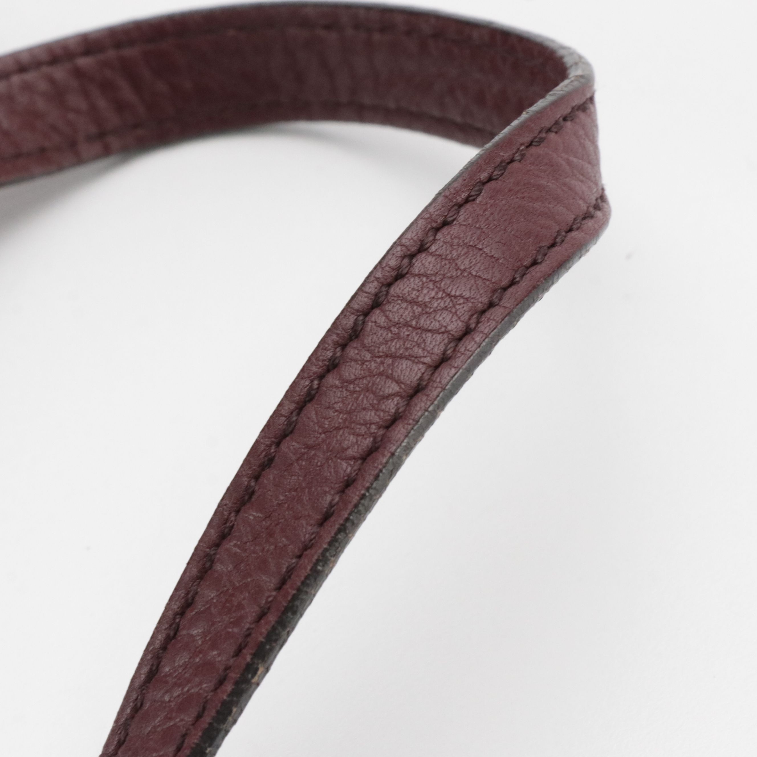 Gucci Interlocking GG Soho Tassel Two-Way Bag in Pebbled Leather