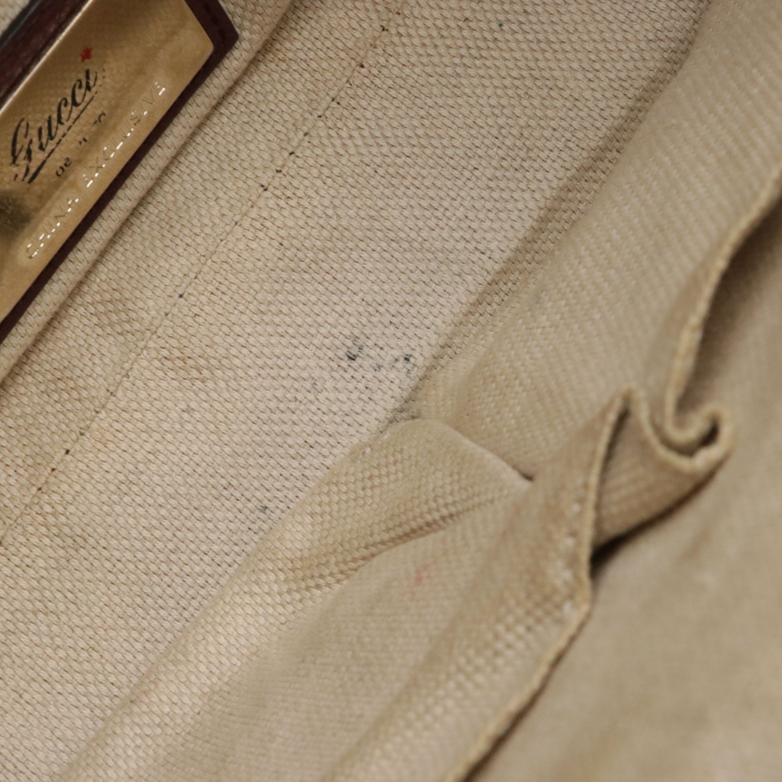 Gucci Interlocking GG Soho Tassel Two-Way Bag in Pebbled Leather