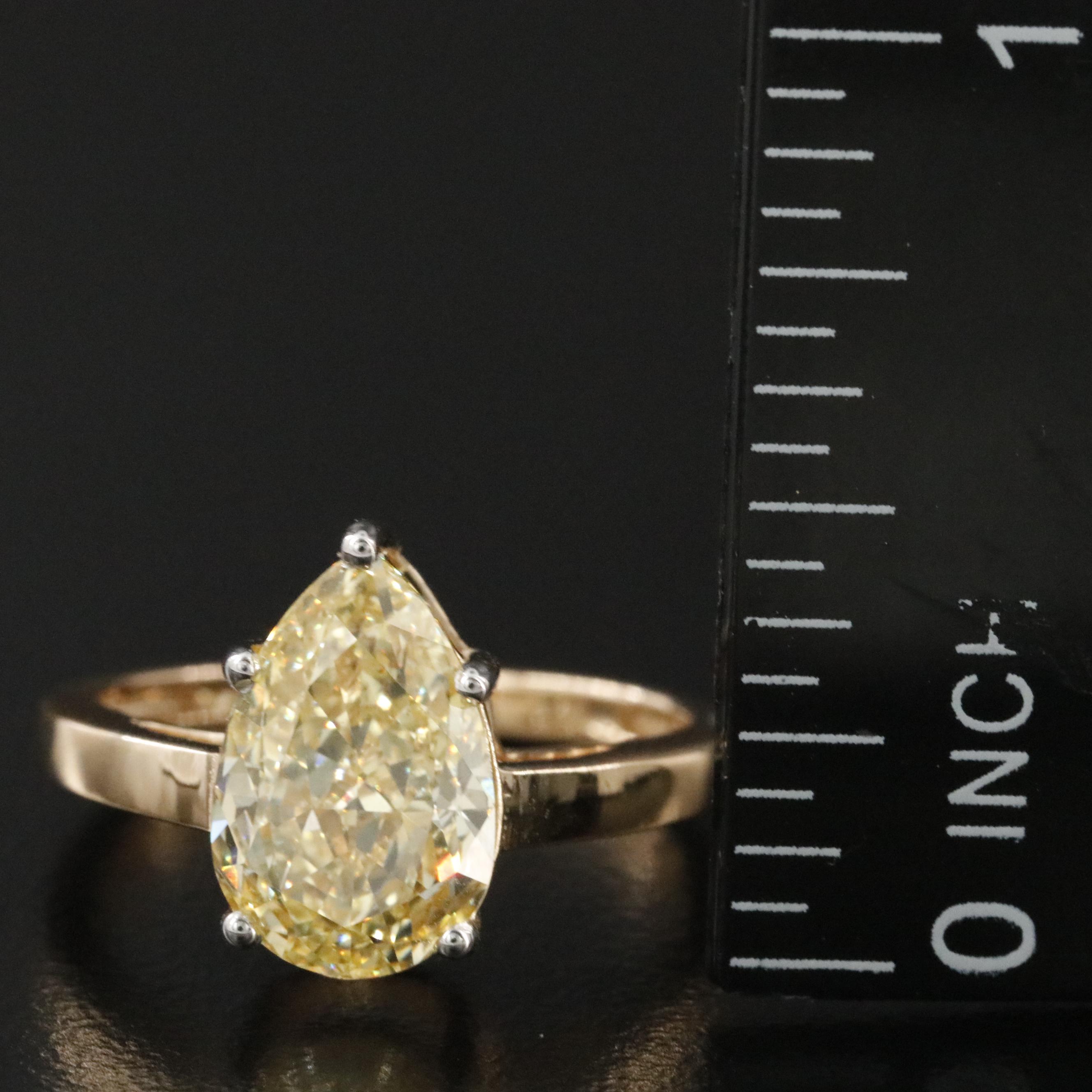 18K 3.04 CTW Lab Grown Fancy Yellow Diamond Solitaire Ring with IGI Report
