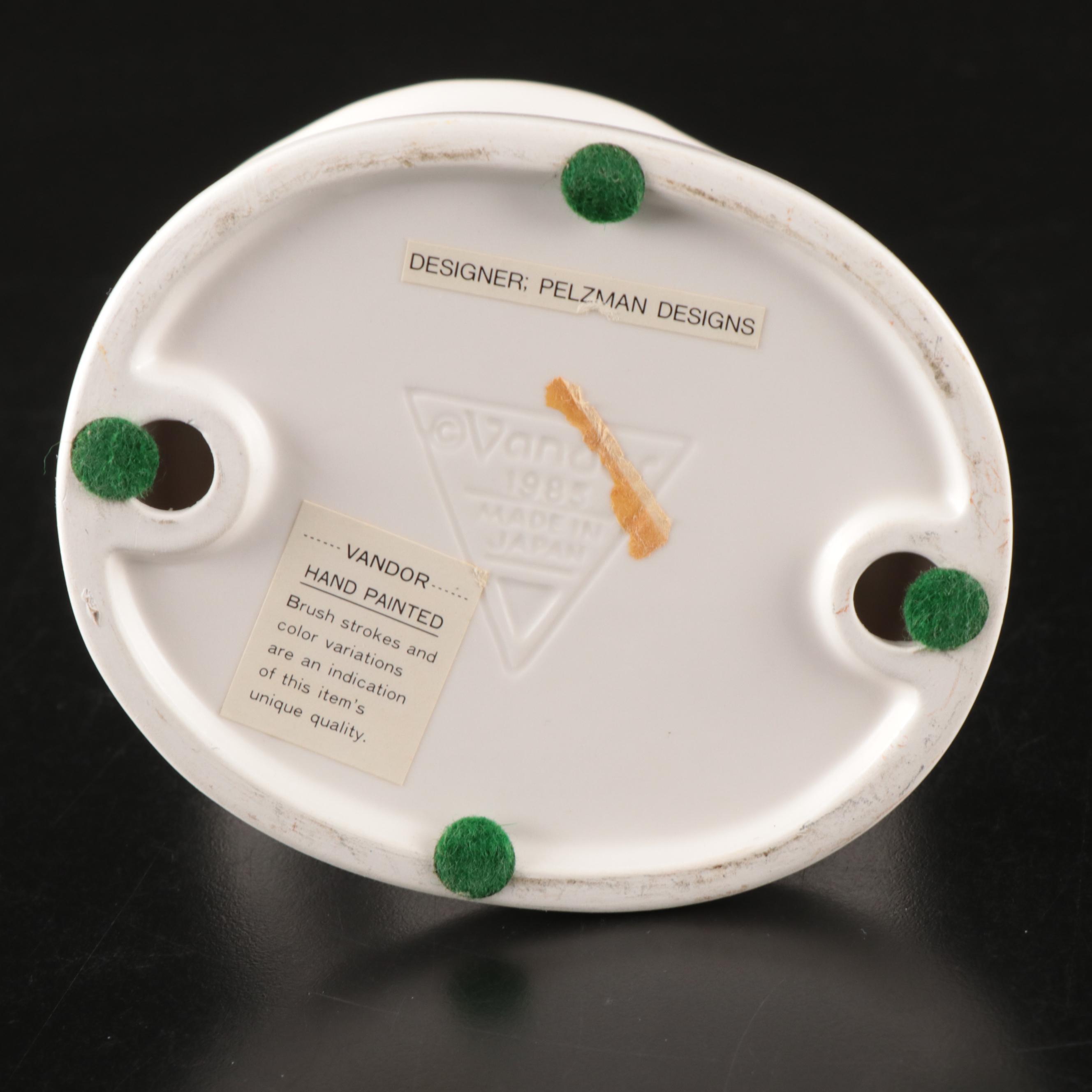 Vandor Porcelain and Glass Figural Bud Vase and Putto Ceramic Bud Vase