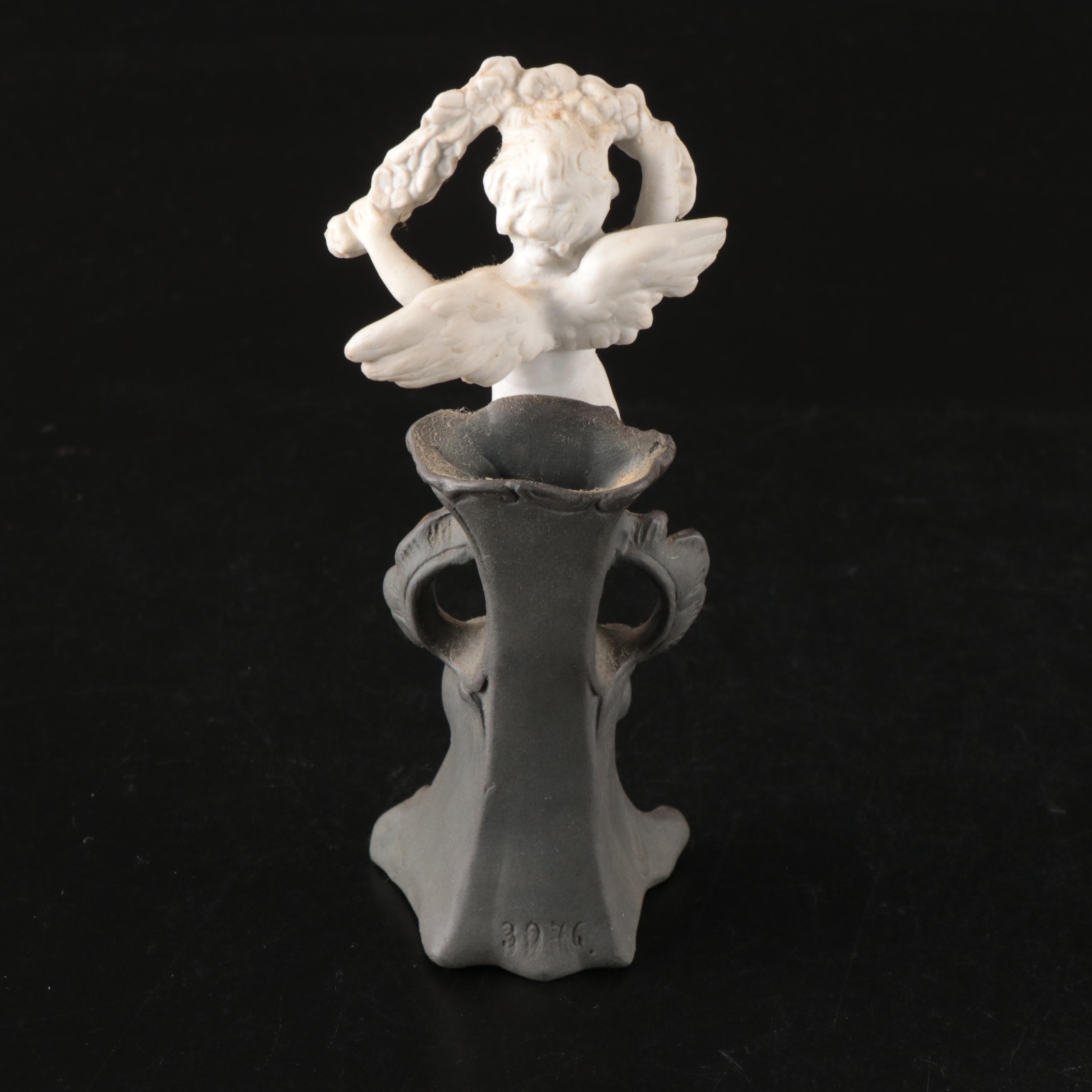 Vandor Porcelain and Glass Figural Bud Vase and Putto Ceramic Bud Vase