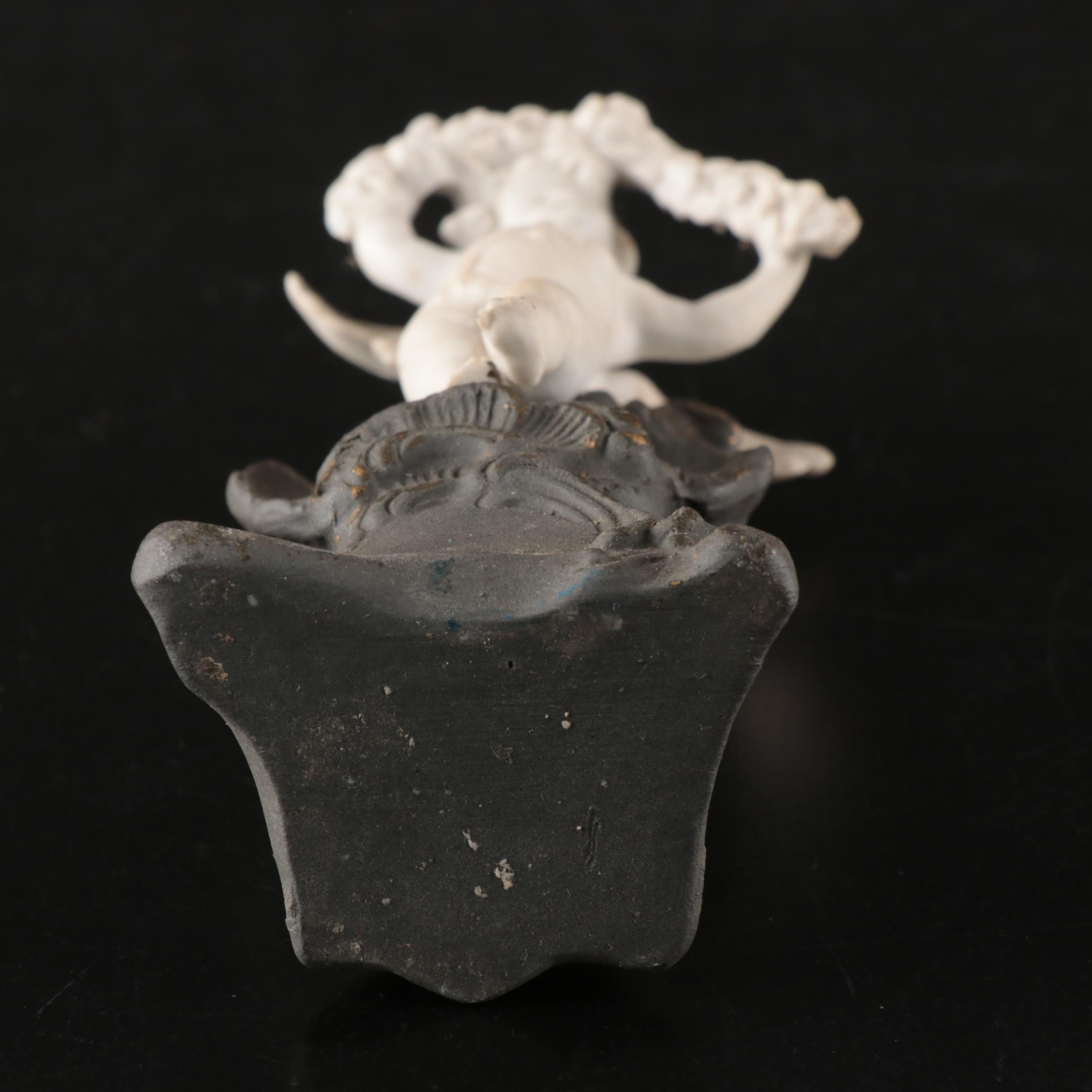 Vandor Porcelain and Glass Figural Bud Vase and Putto Ceramic Bud Vase