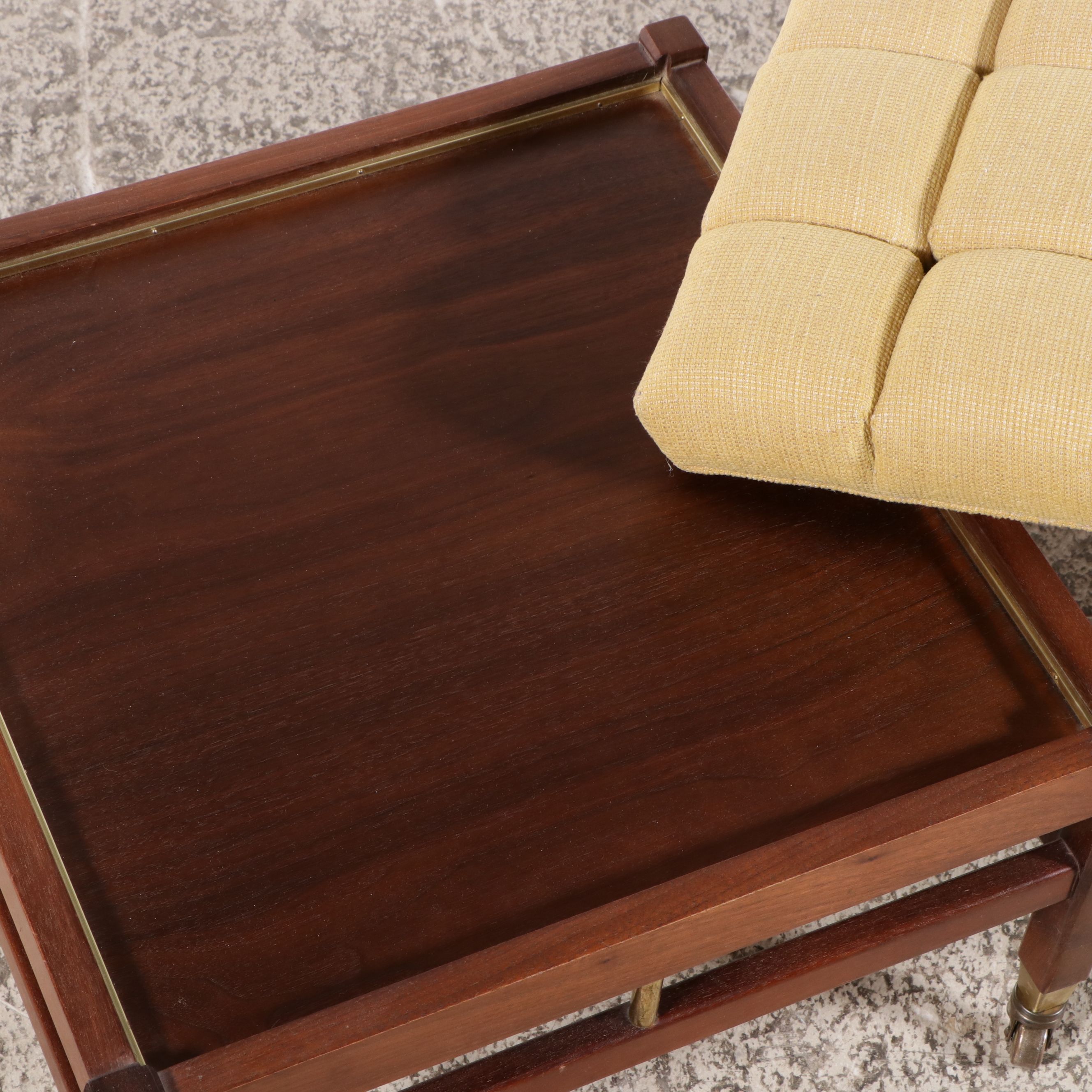 Pair of Mid Century Modern Walnut and Brass Tufted Ottomans