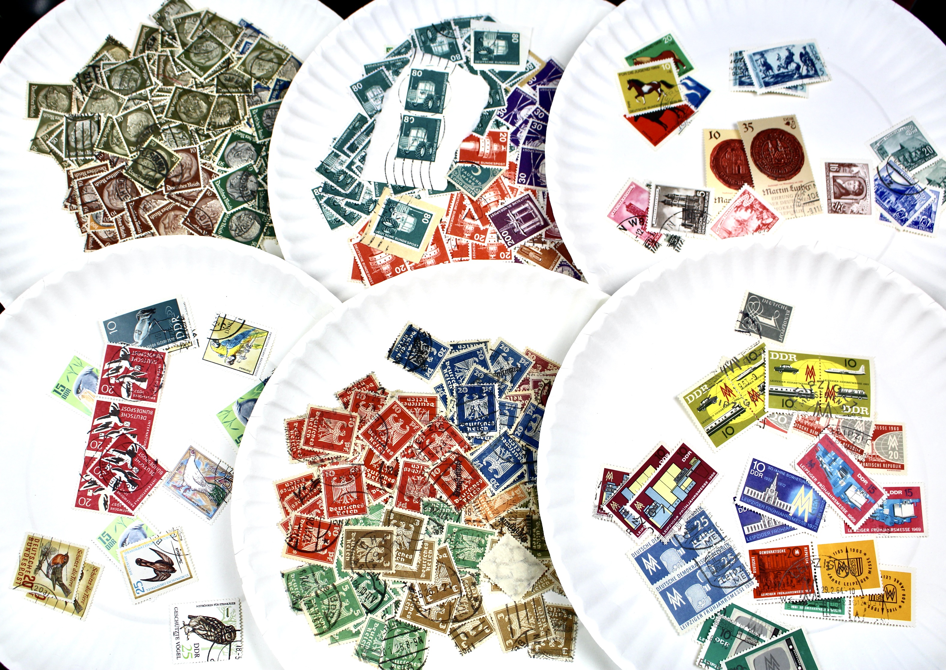 Box of Thousands of Mint and Used Worldwide Postage Stamps