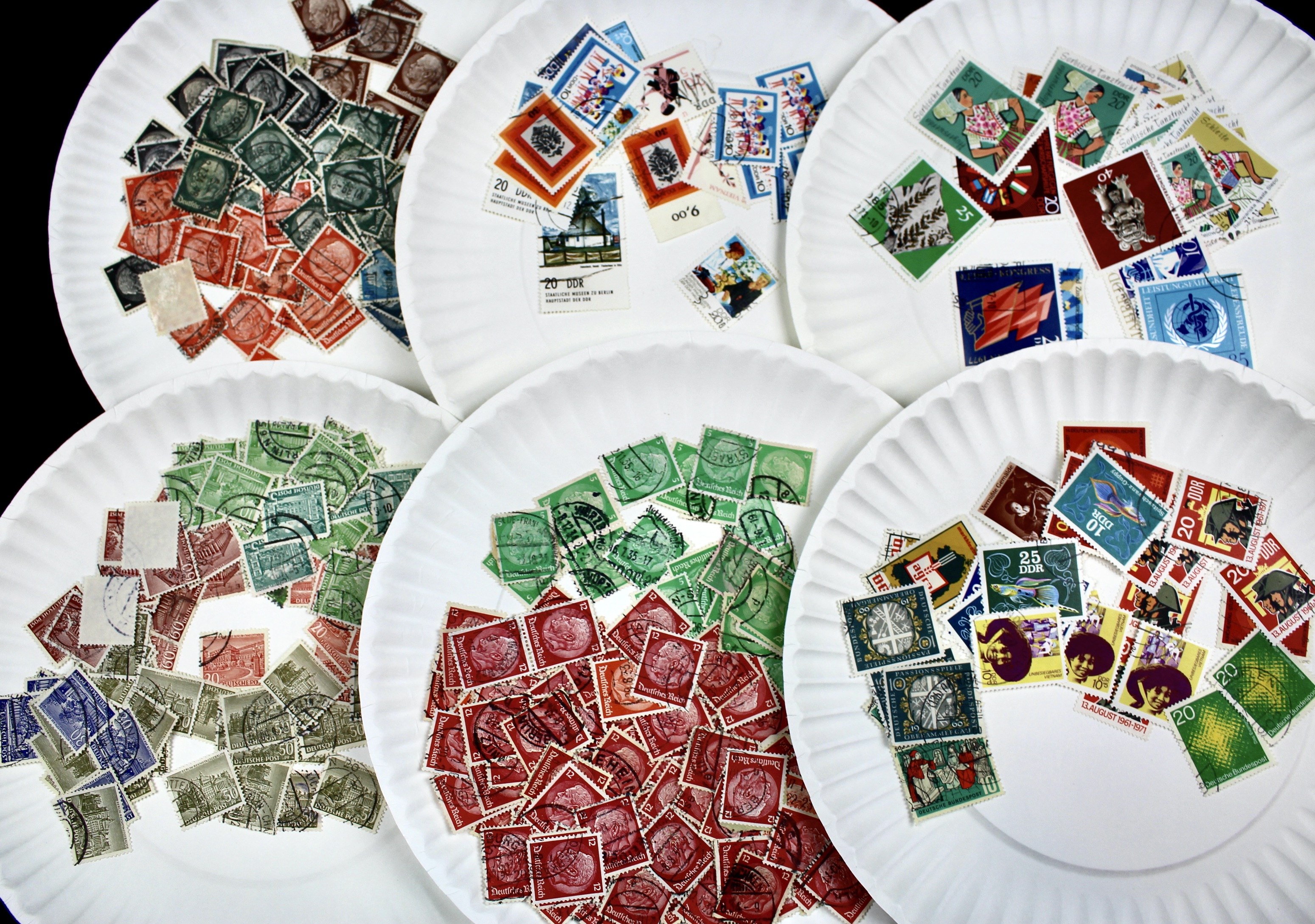 Box of Thousands of Mint and Used Worldwide Postage Stamps