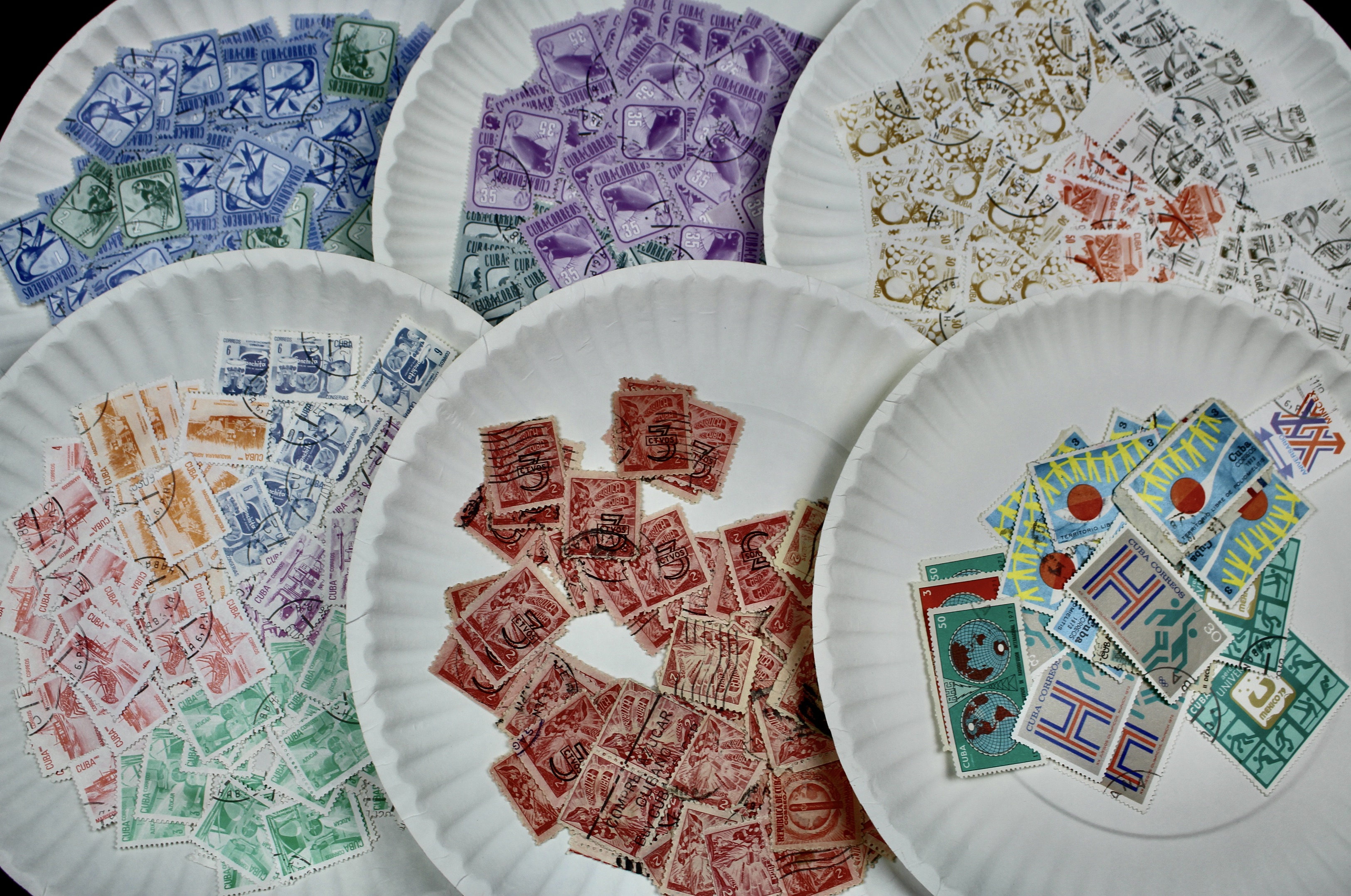 Box of Thousands of Mint and Used Worldwide Postage Stamps