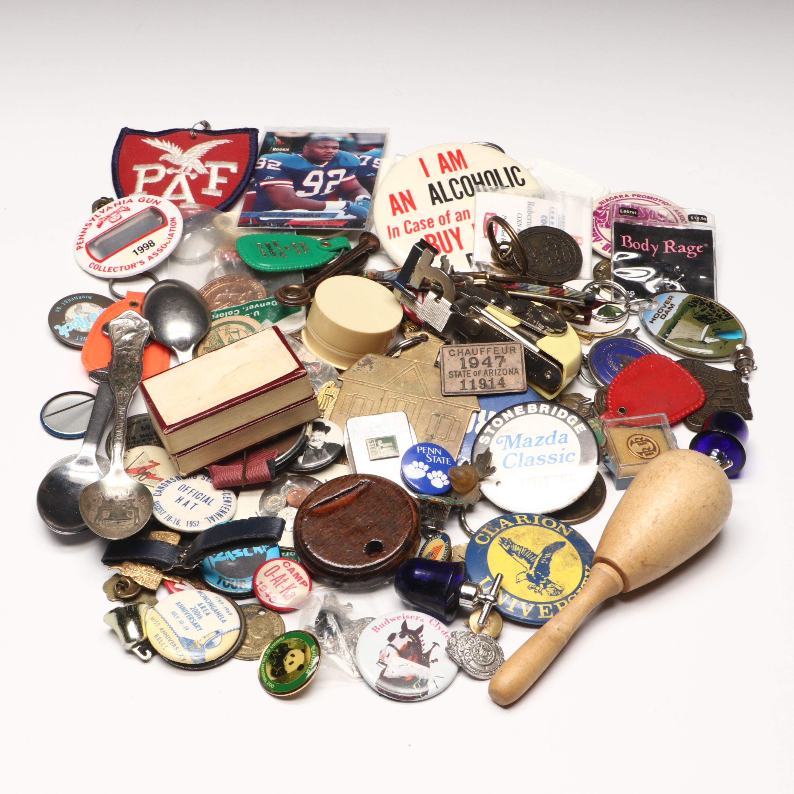 Collection of Pinbacks, Patches, Souvenir Spoons, and More Souvenirs