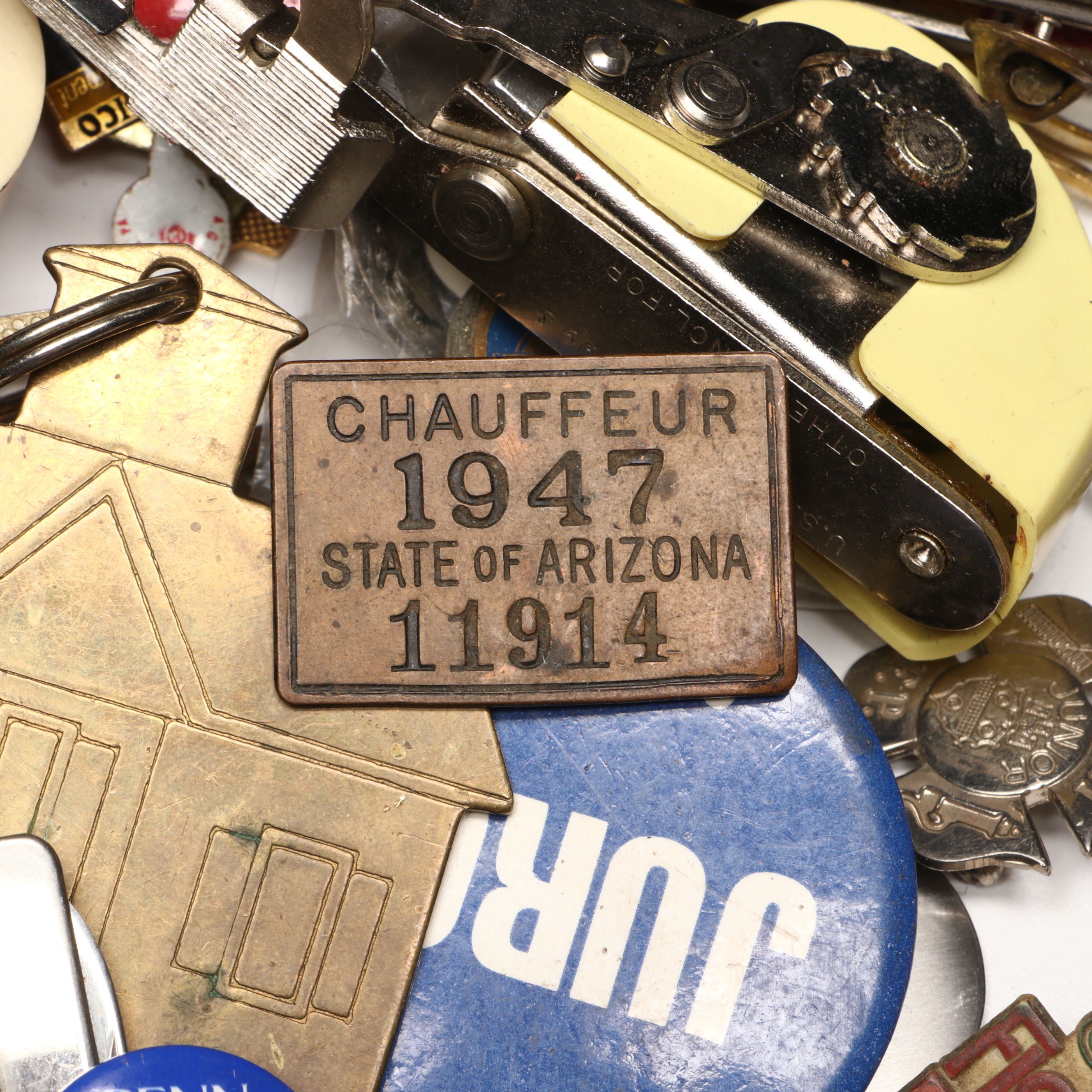 Collection of Pinbacks, Patches, Souvenir Spoons, and More Souvenirs