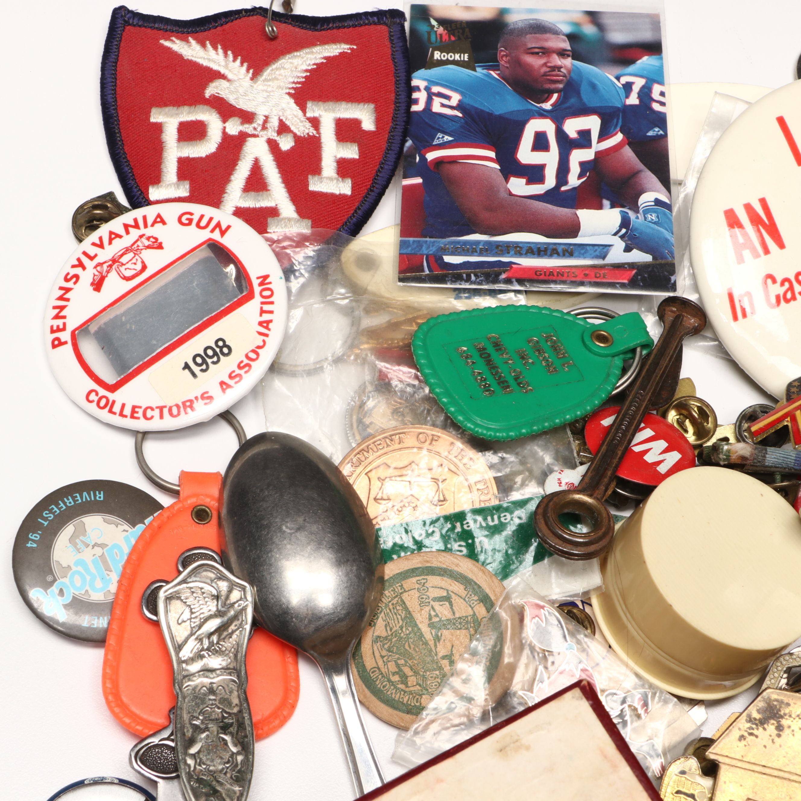 Collection of Pinbacks, Patches, Souvenir Spoons, and More Souvenirs