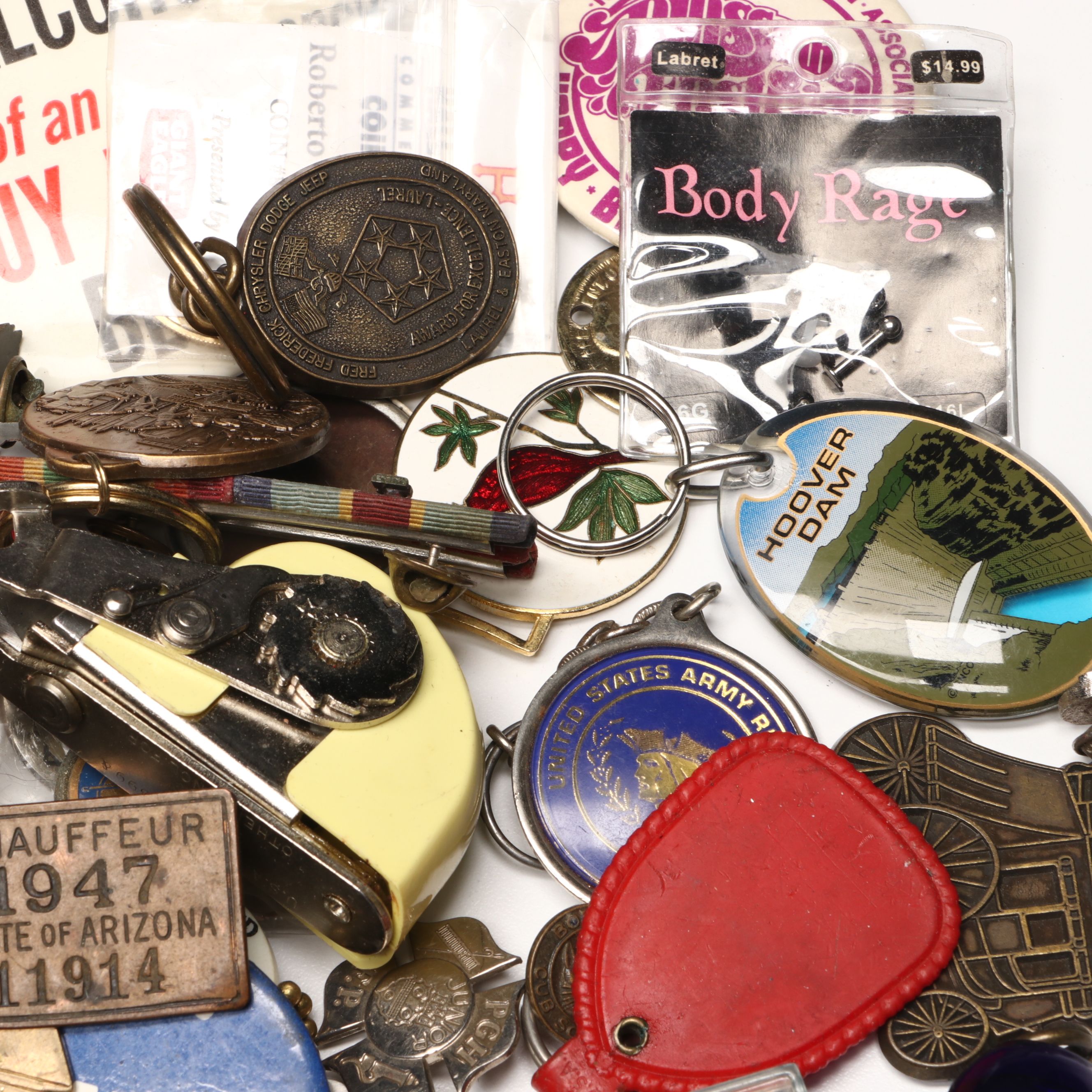 Collection of Pinbacks, Patches, Souvenir Spoons, and More Souvenirs