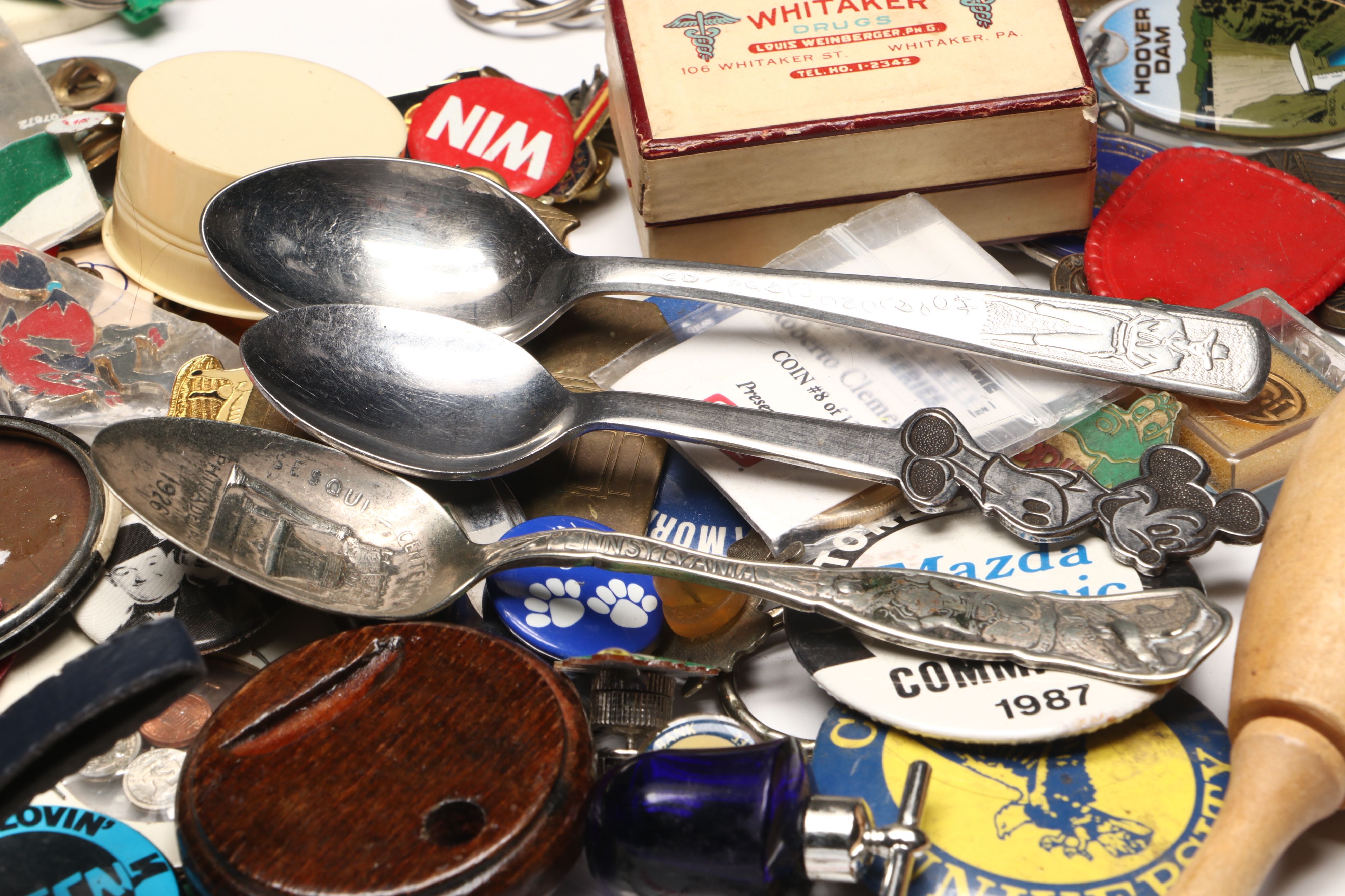 Collection of Pinbacks, Patches, Souvenir Spoons, and More Souvenirs