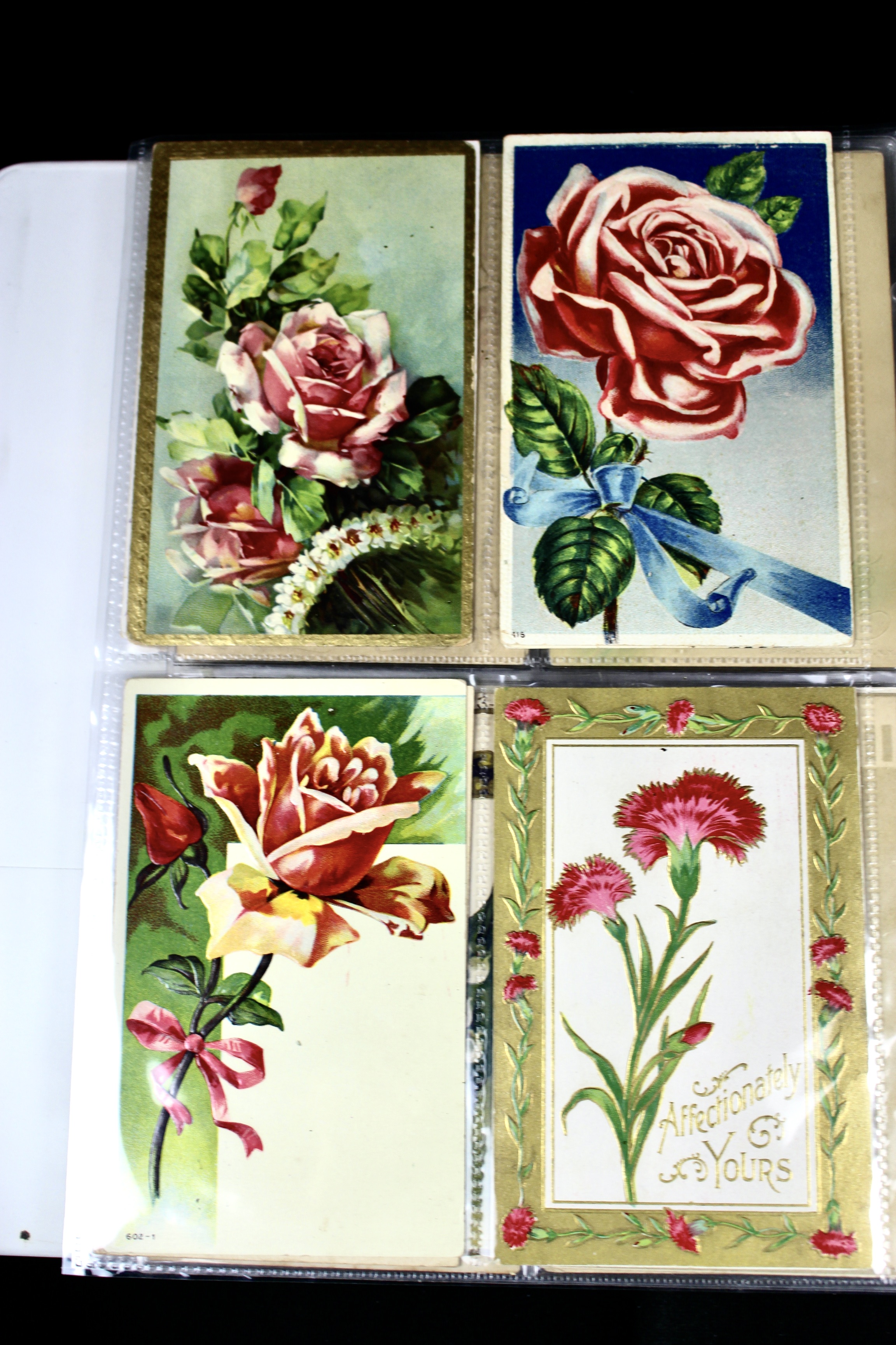 Album of 99 Embossed Floral-Themed Postcards, Early 1900s