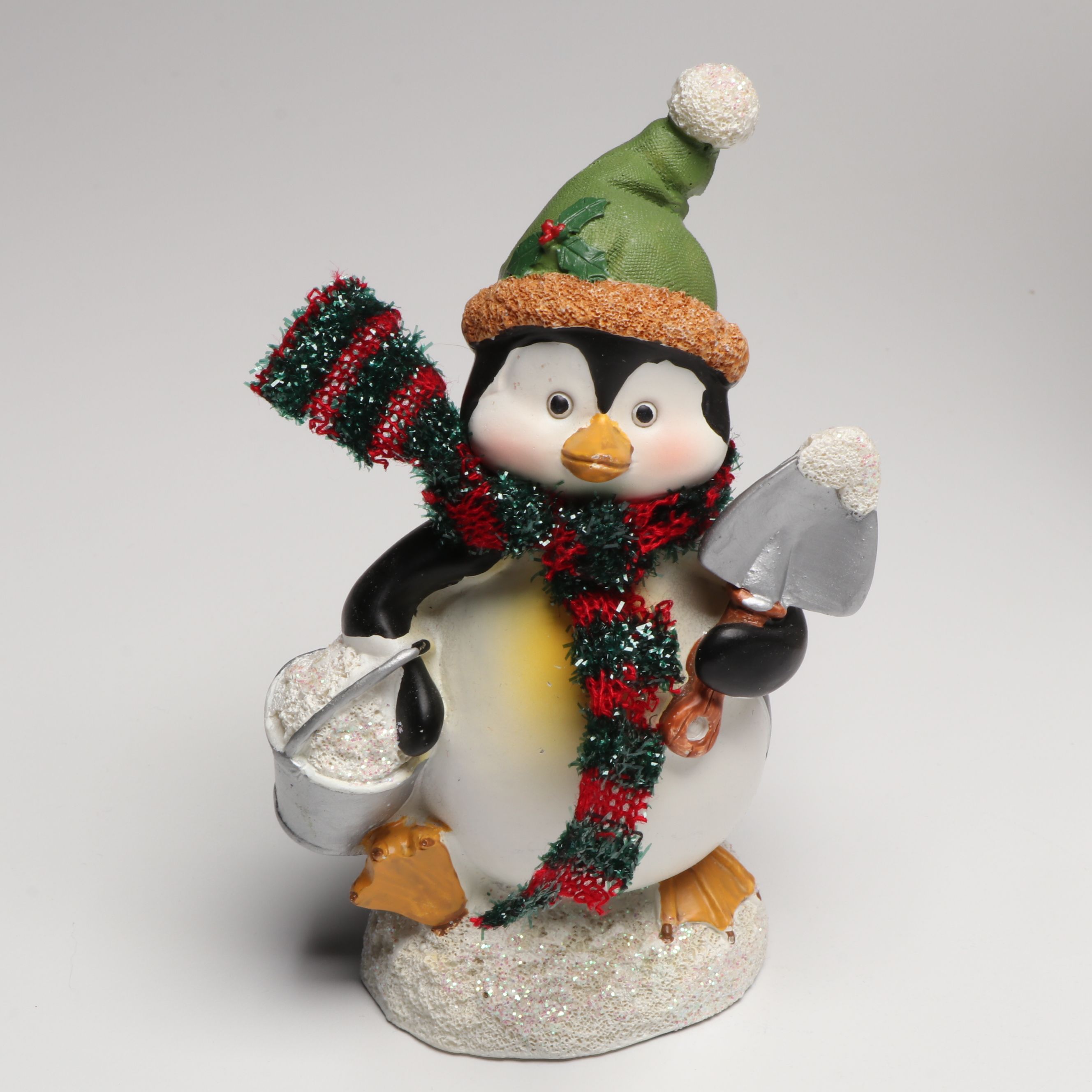 Penguin Figural Ceramic Cookie Jar with Other Penguin Canisters and Figures
