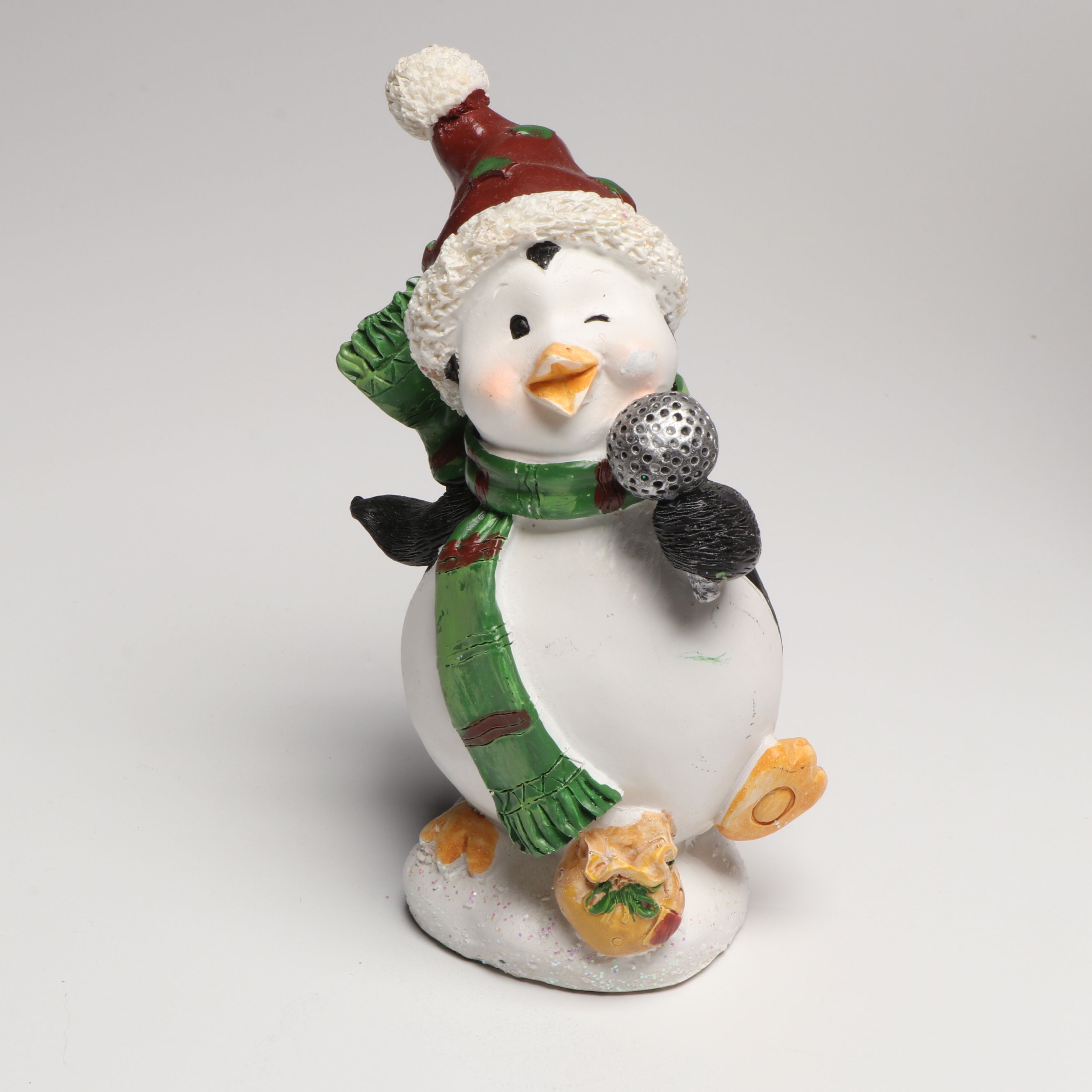 Penguin Figural Ceramic Cookie Jar with Other Penguin Canisters and Figures