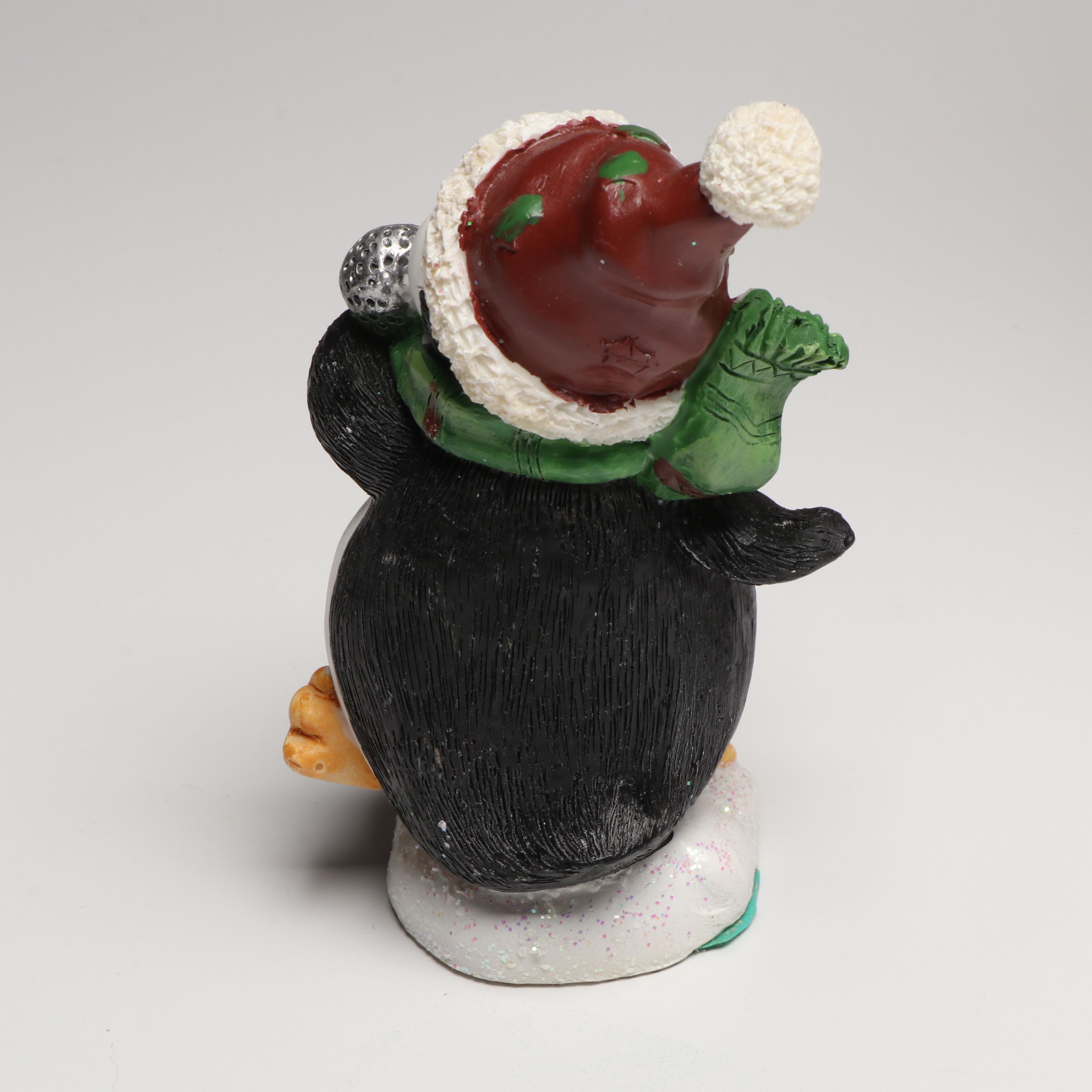 Penguin Figural Ceramic Cookie Jar with Other Penguin Canisters and Figures