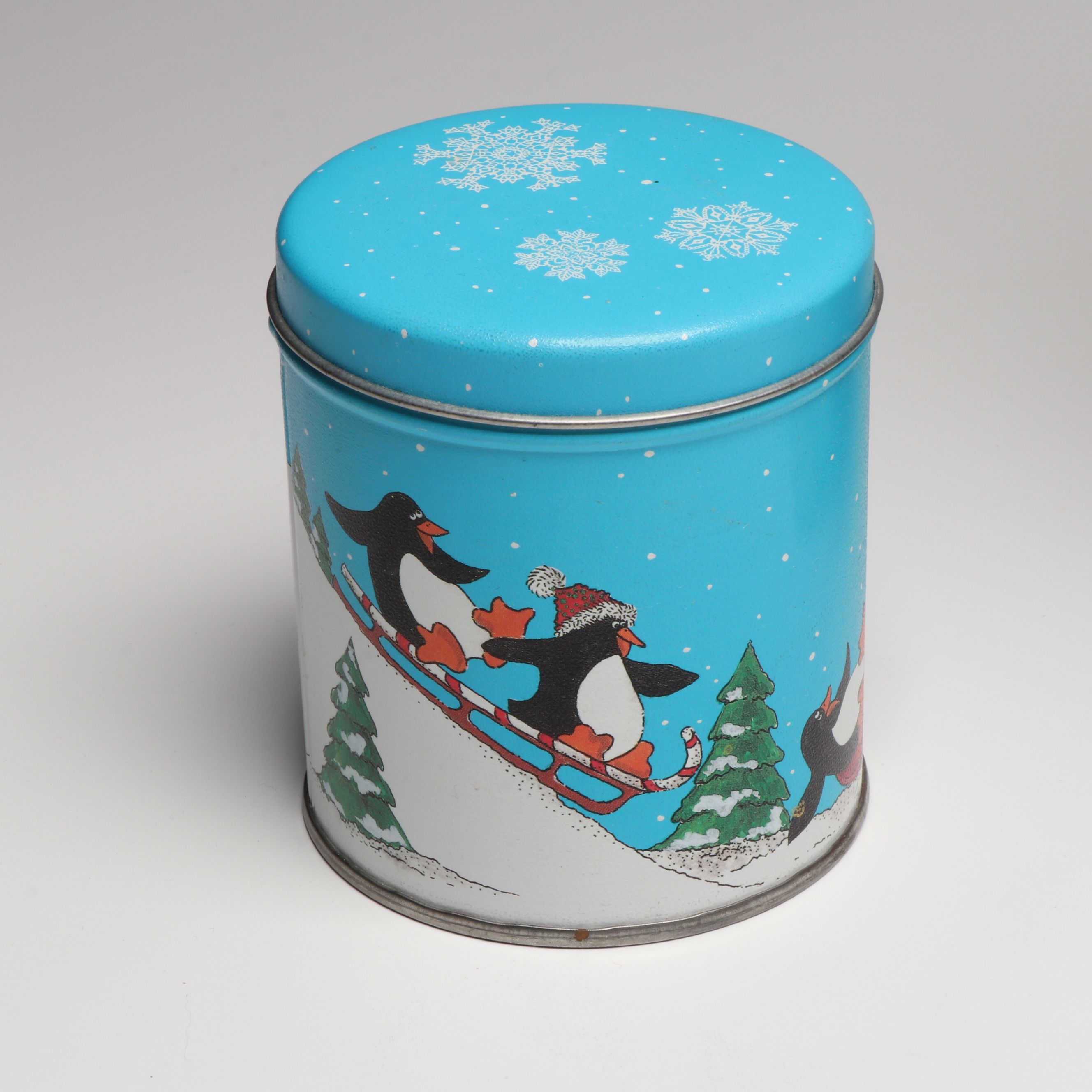 Penguin Figural Ceramic Cookie Jar with Other Penguin Canisters and Figures