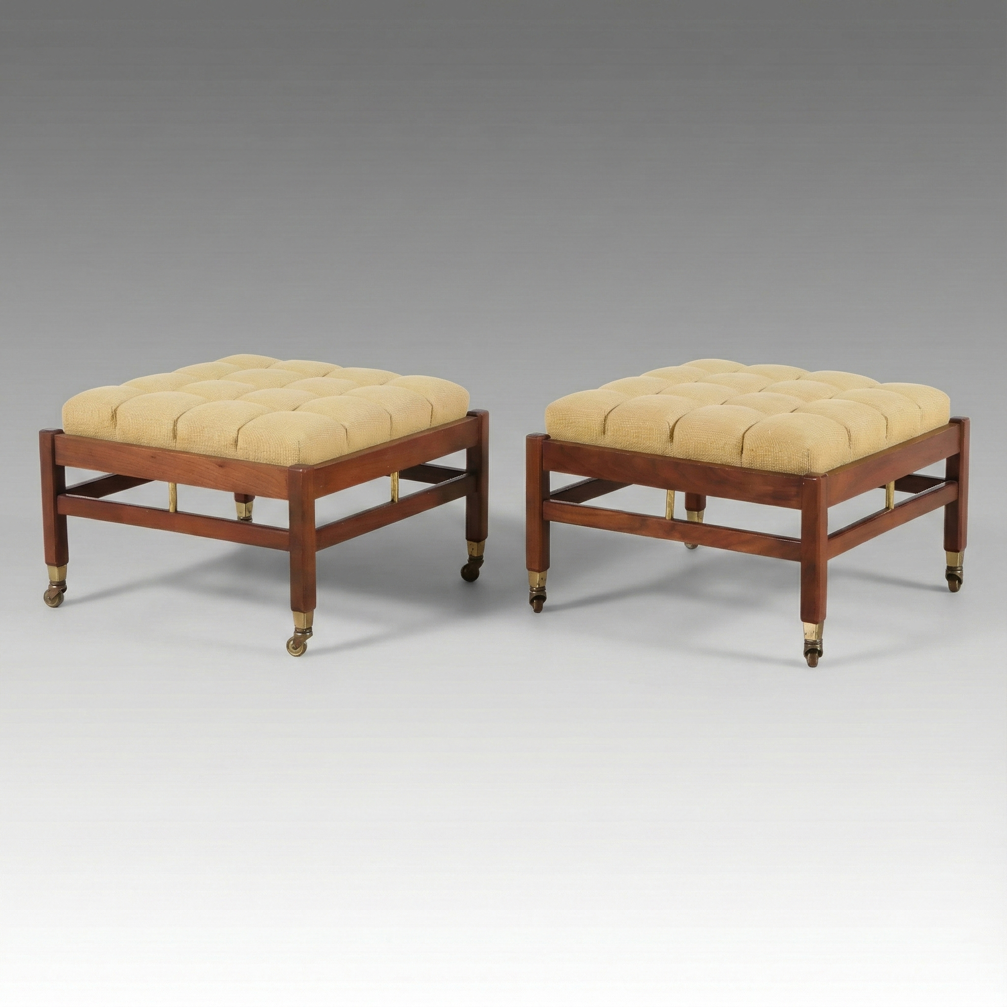 Pair of Mid Century Modern Walnut and Brass Tufted Ottomans
