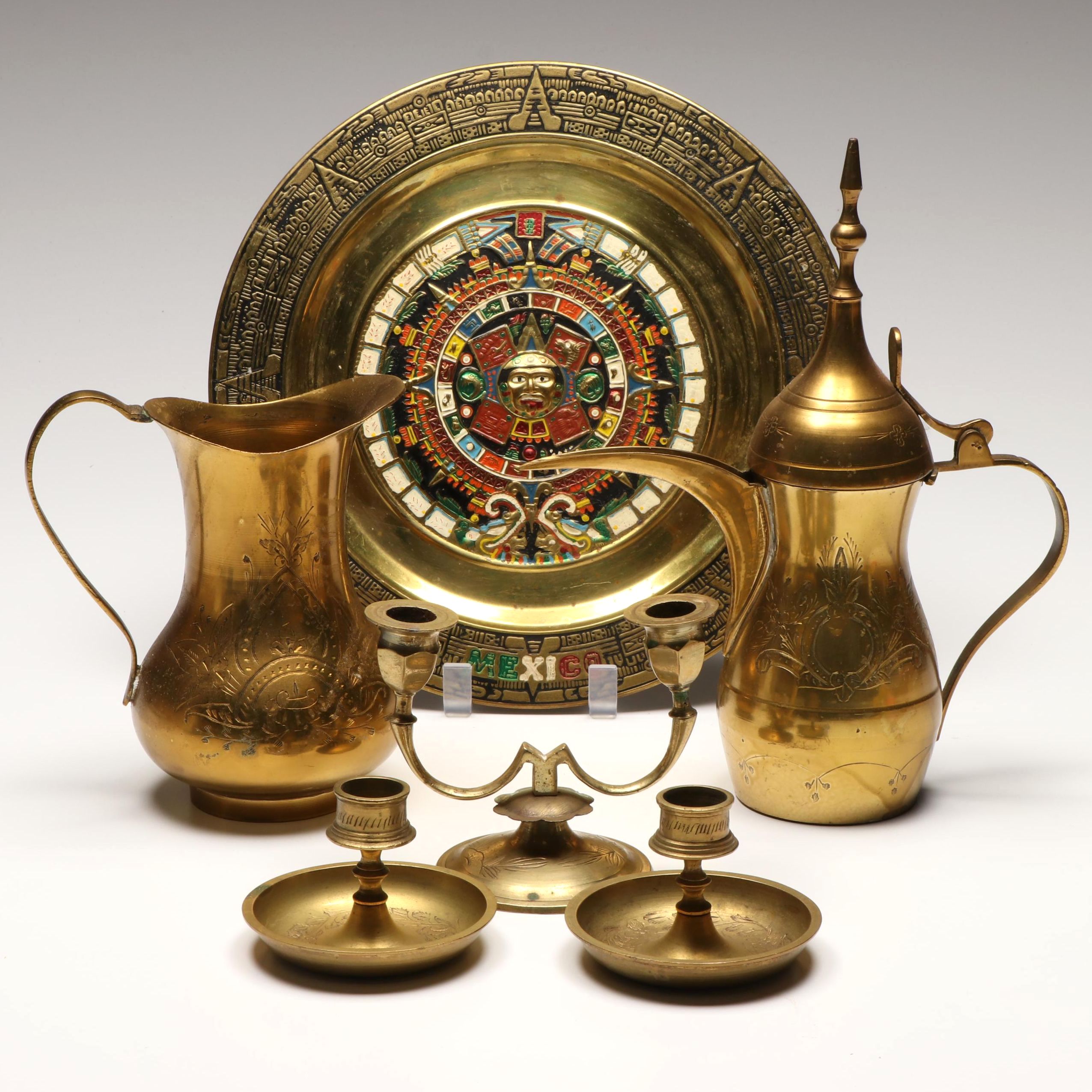 Indian Brass Candle Holders with Pitchers and Mexican Aztec Style Brass Plate