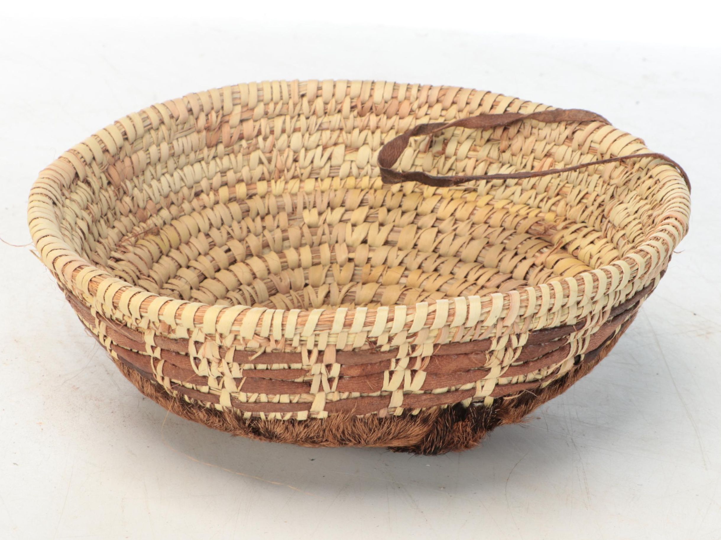 Omani Handcrafted Goat Skin and Date Palm Baskets