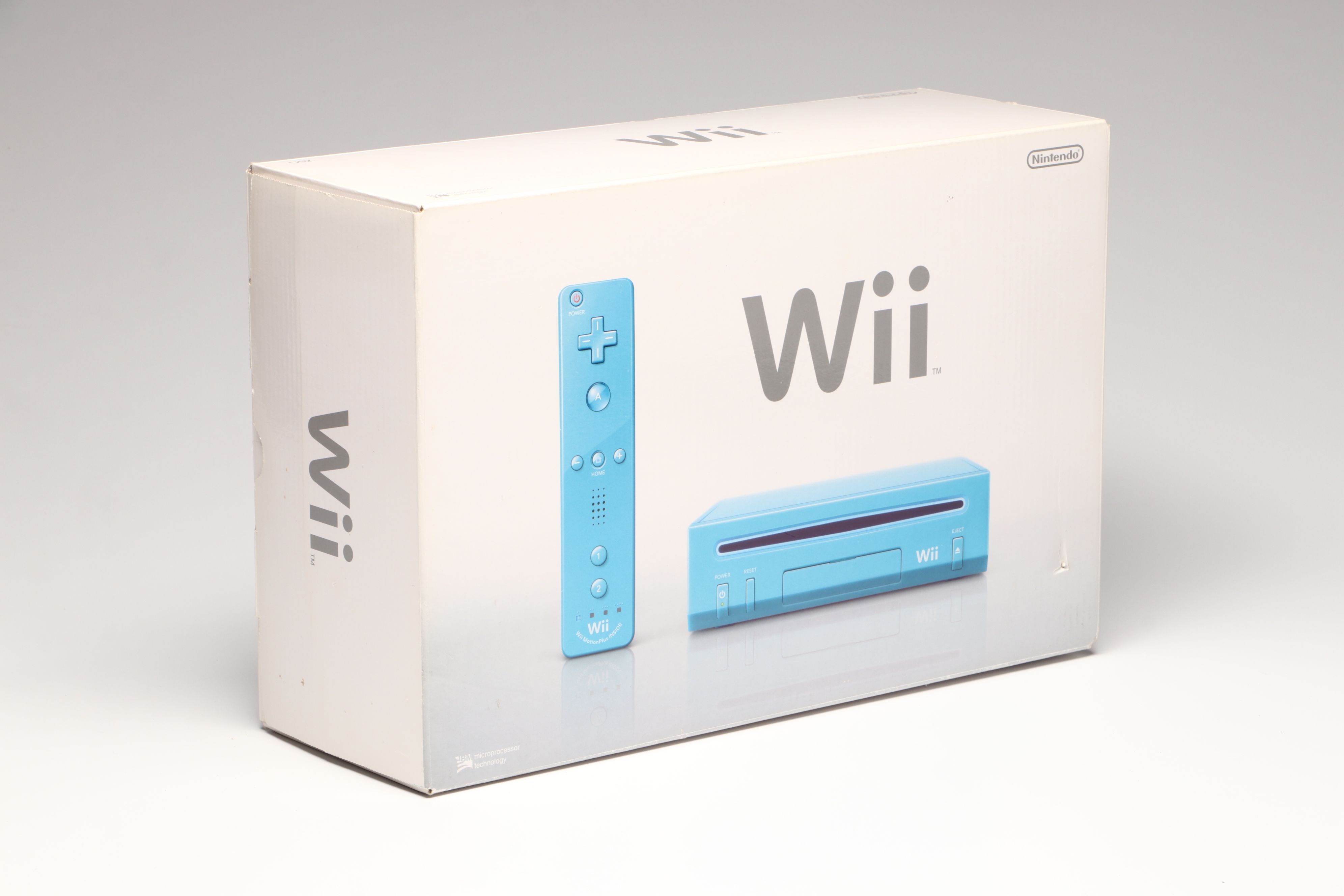 Nintendo Wii Console, Remote Plus, and Nunchuk