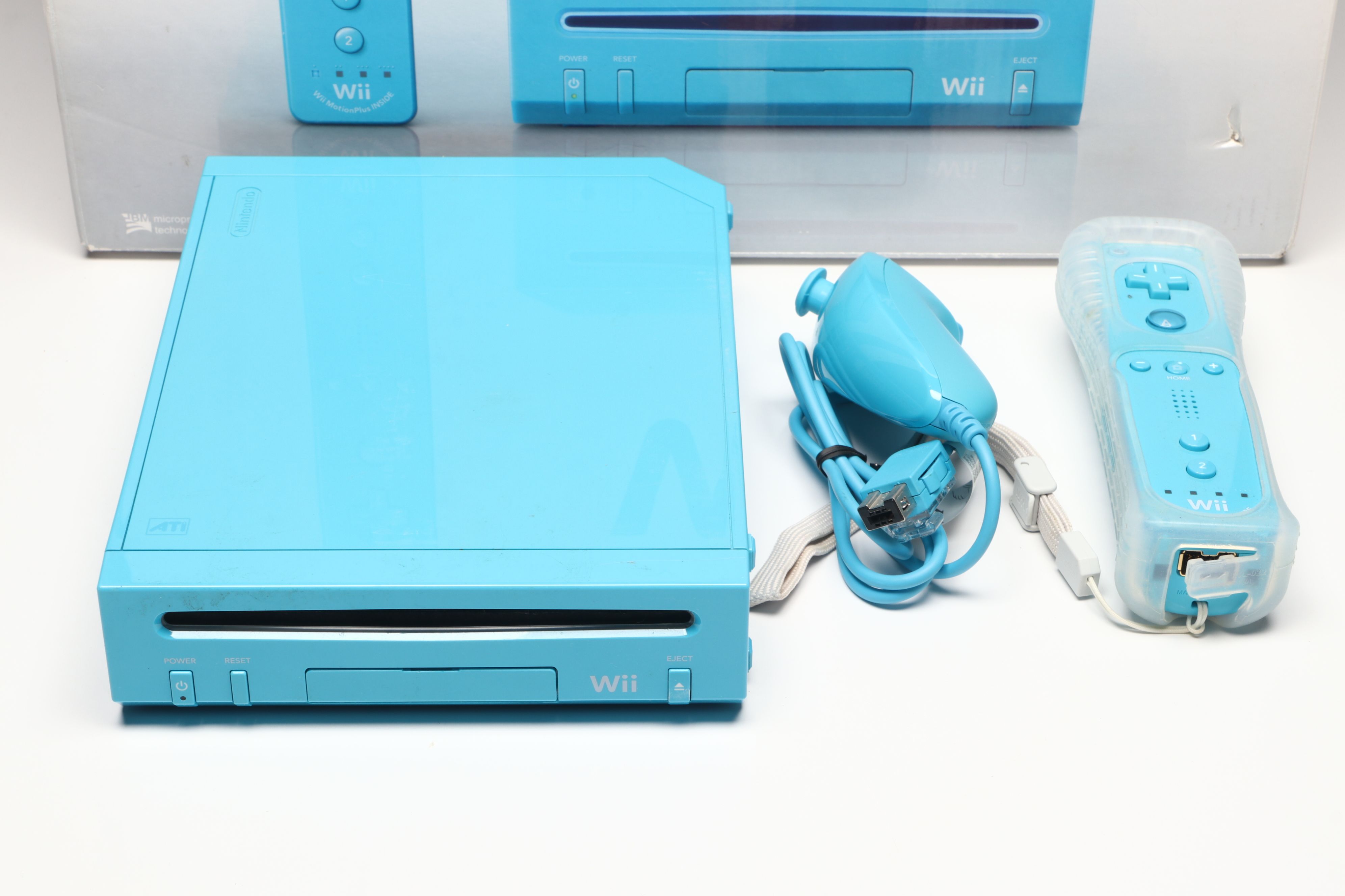 Nintendo Wii Console, Remote Plus, and Nunchuk