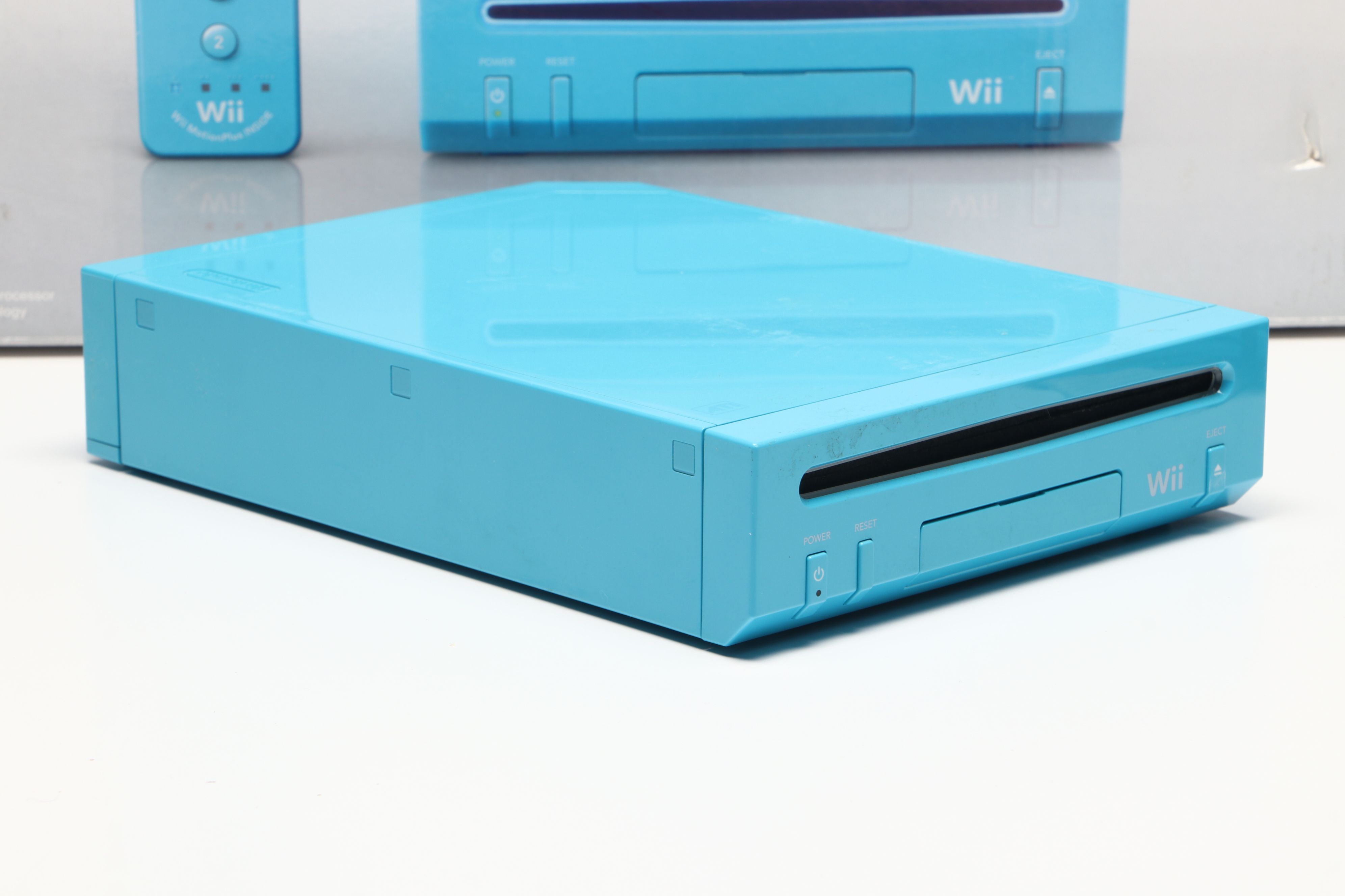 Nintendo Wii Console, Remote Plus, and Nunchuk