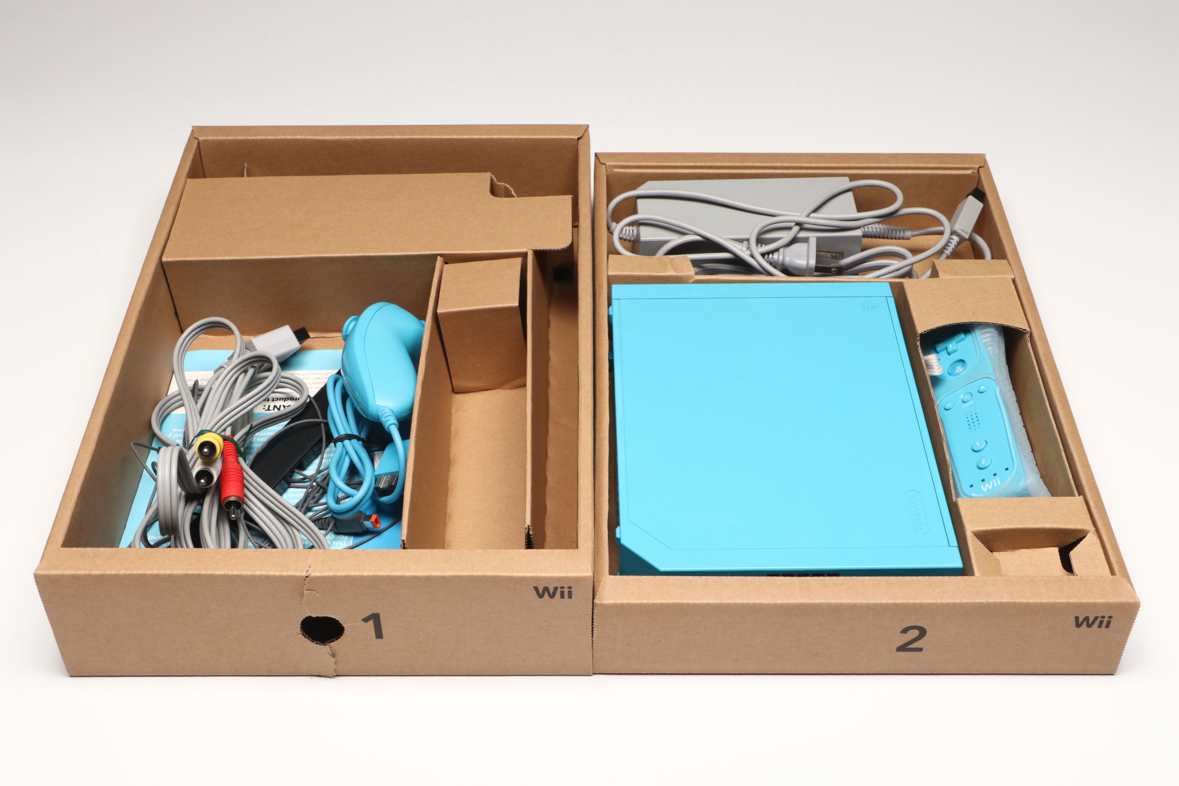 Nintendo Wii Console, Remote Plus, and Nunchuk