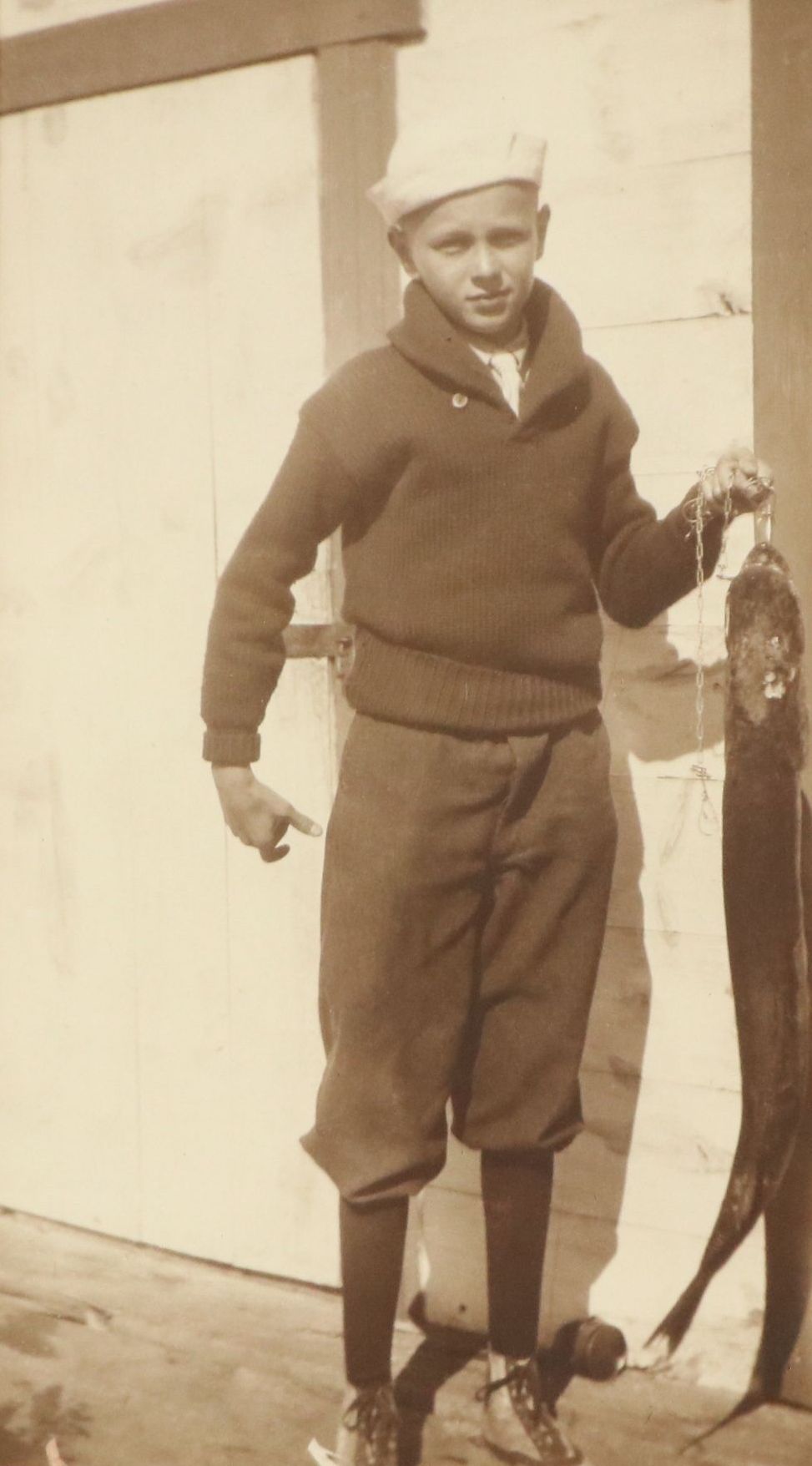 Silver Print Depicting Sailor Boy Holding Fish, Circa 1910