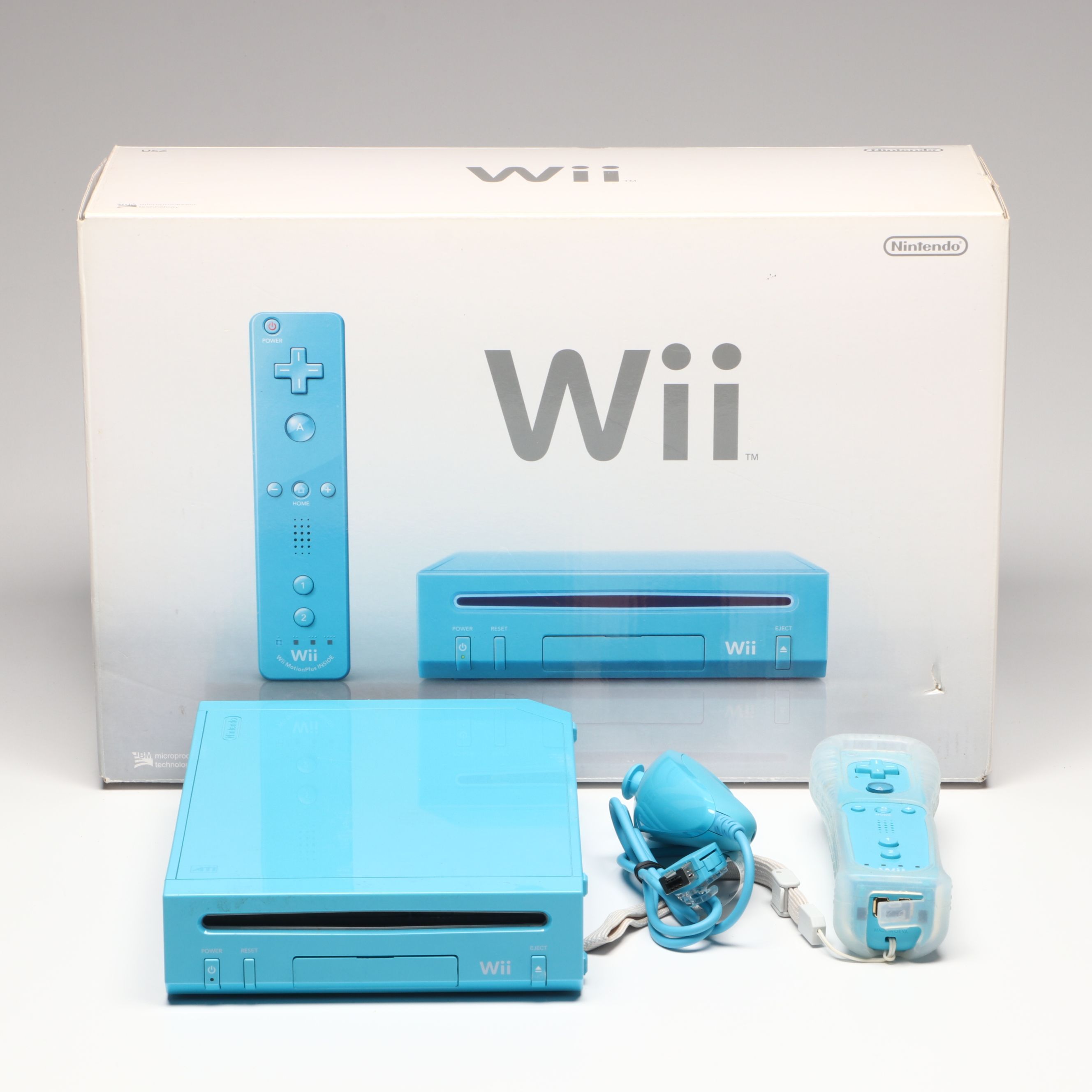 Nintendo Wii Console, Remote Plus, and Nunchuk