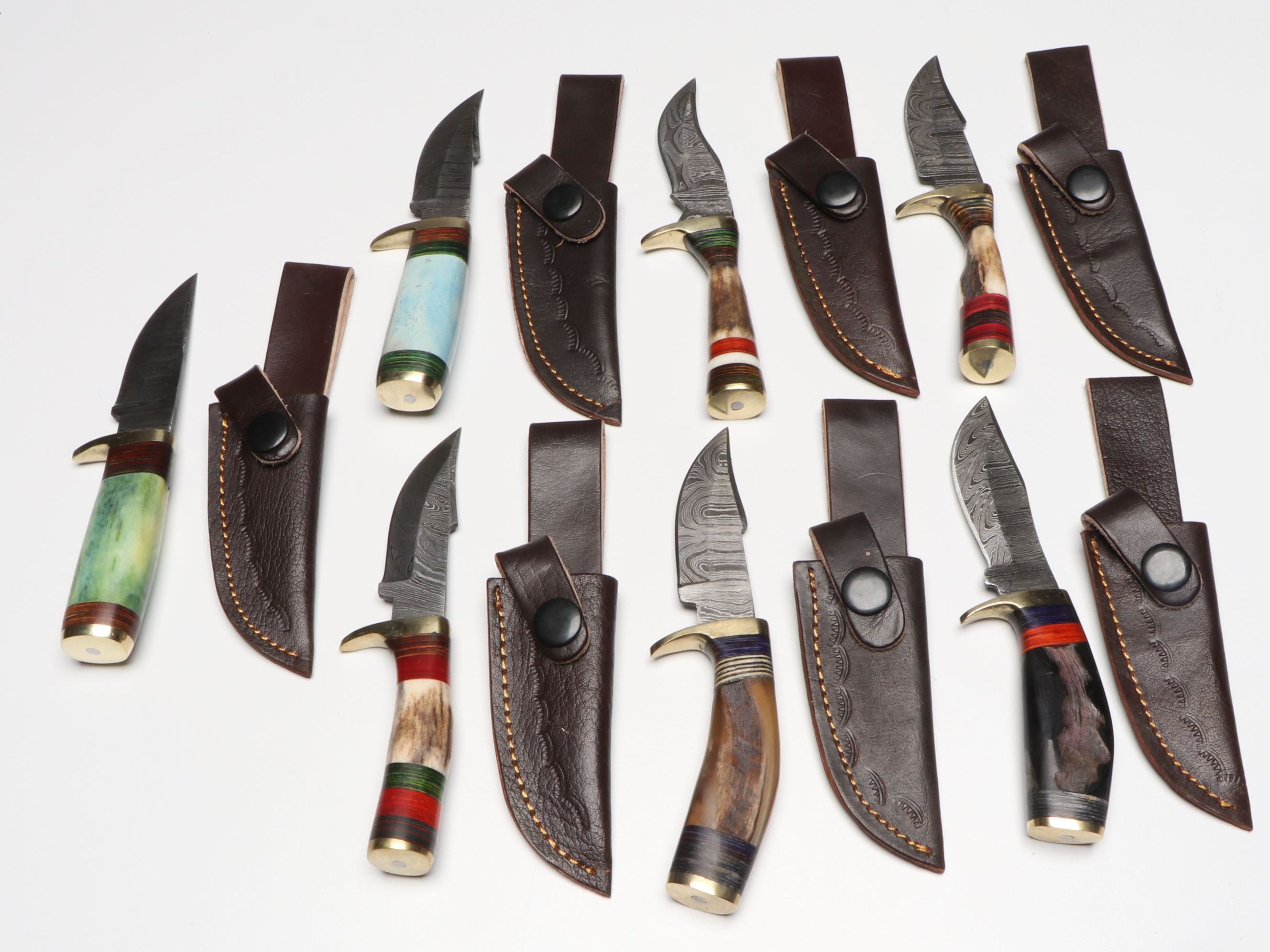 Damascus Steel Skinner Knives in Leather Scabbards