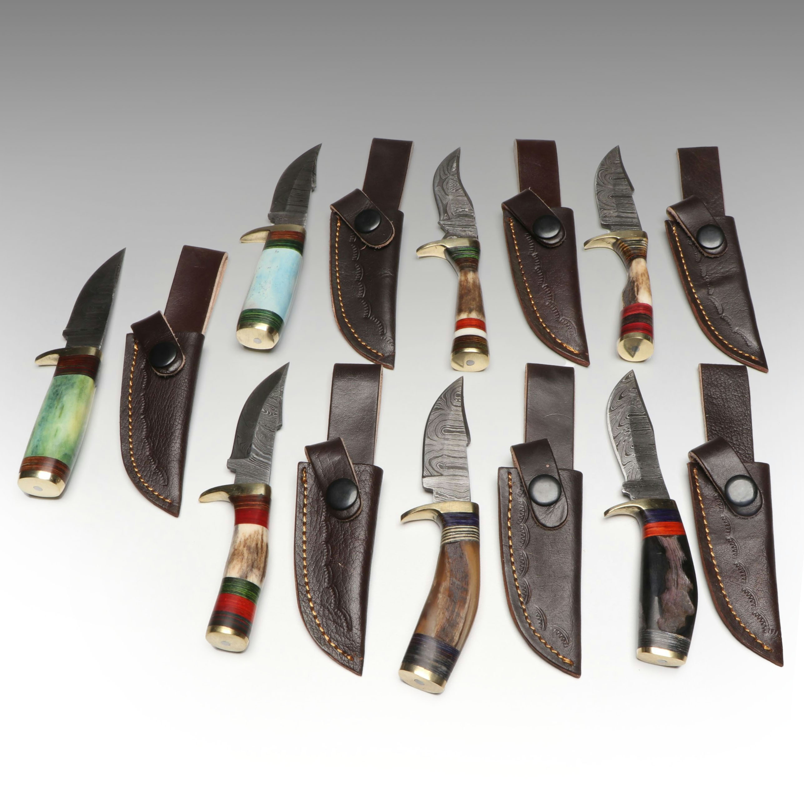 Damascus Steel Skinner Knives in Leather Scabbards