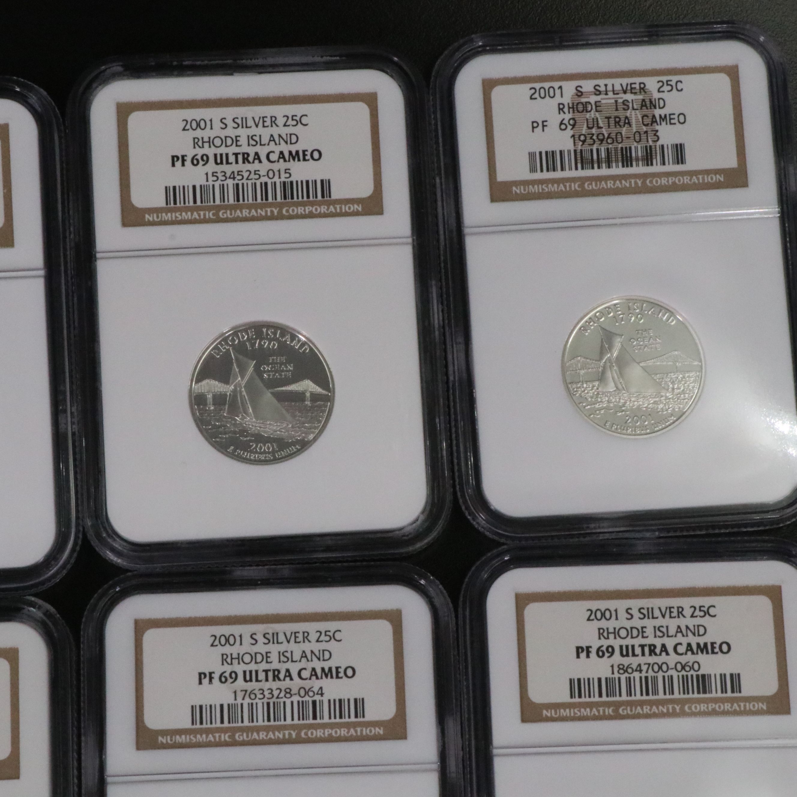 Fifteen NGC PF 69 Ultra Cameo 2001-S Rhode Island Silver State Quarters