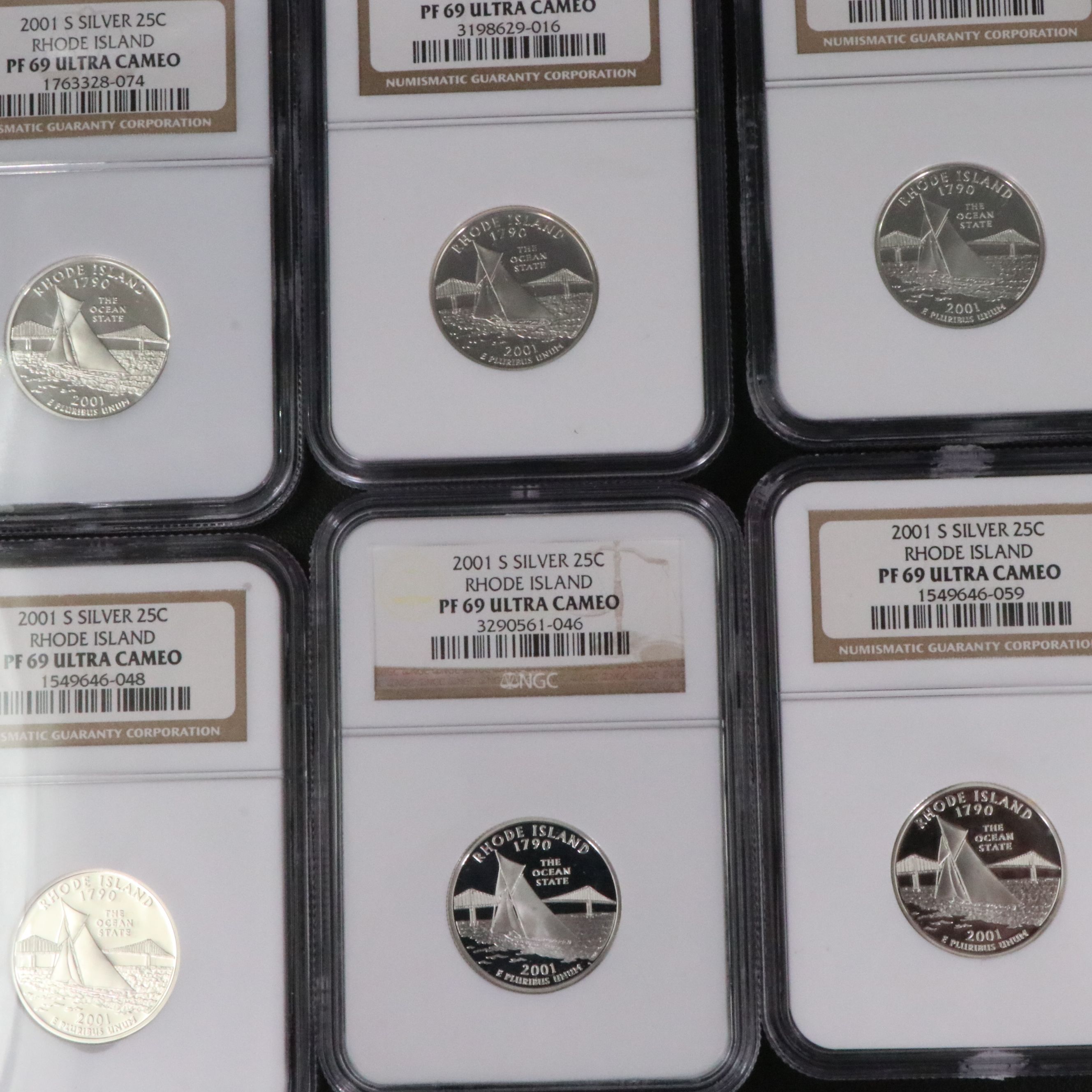 Fifteen NGC PF 69 Ultra Cameo 2001-S Rhode Island Silver State Quarters