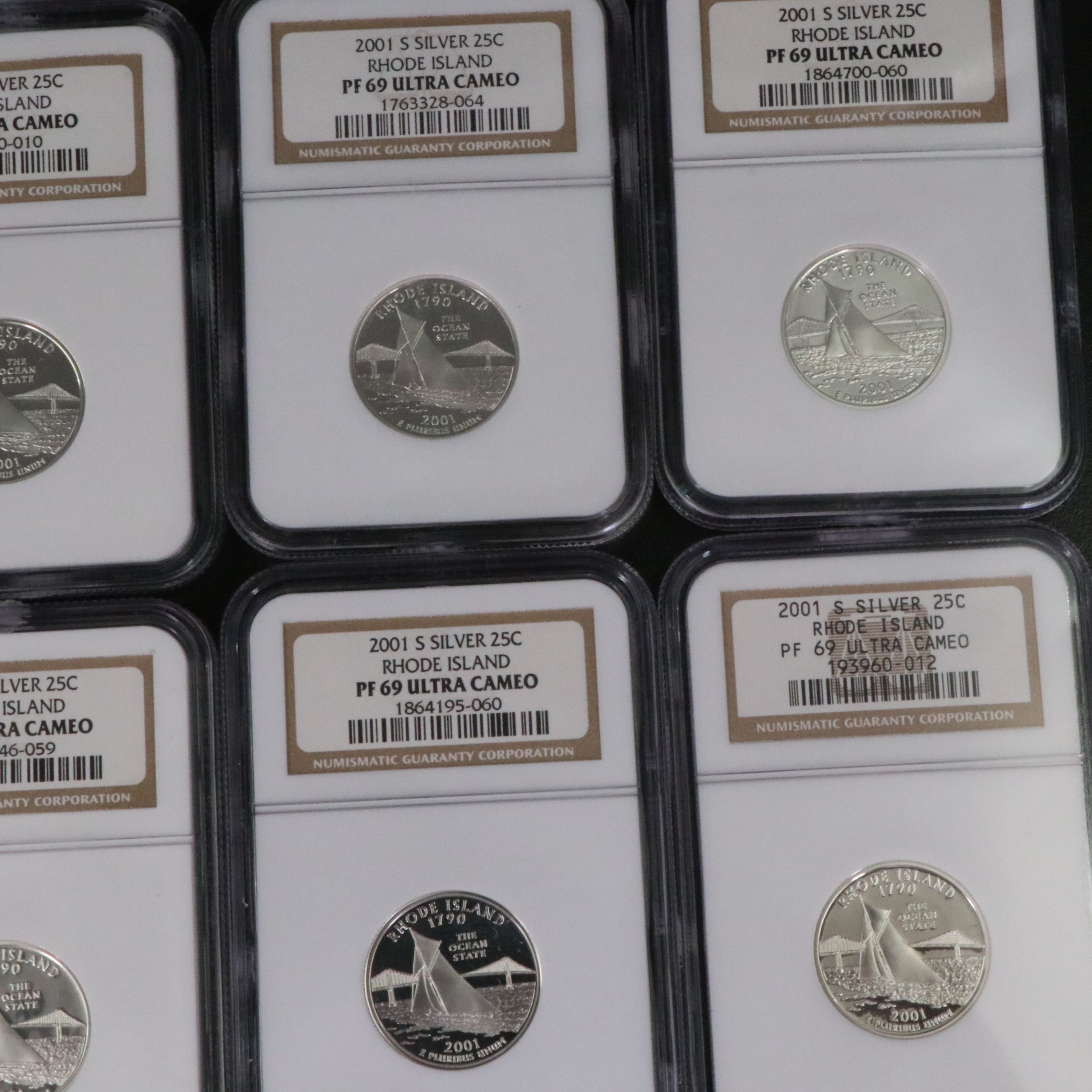 Fifteen NGC PF 69 Ultra Cameo 2001-S Rhode Island Silver State Quarters