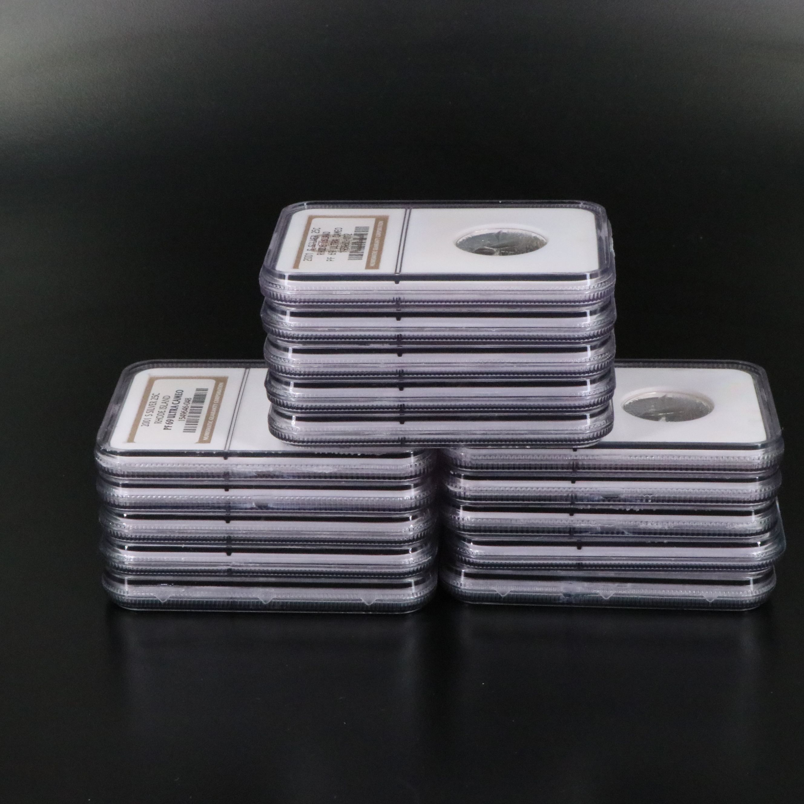 Fifteen NGC PF 69 Ultra Cameo 2001-S Rhode Island Silver State Quarters